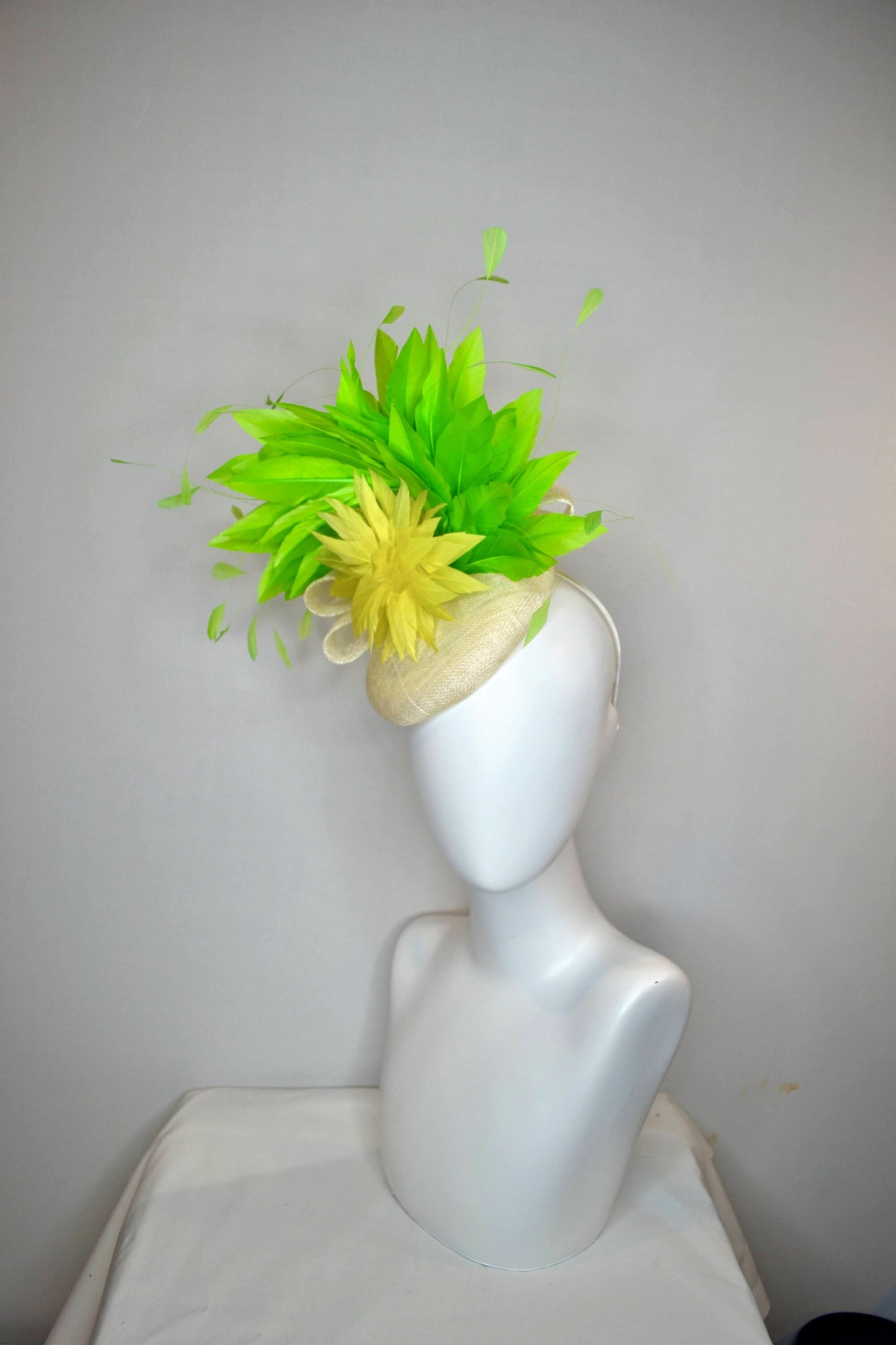 kentucky derby hat fascinator ivory sinamay base yellow feather flower with lime green feathers