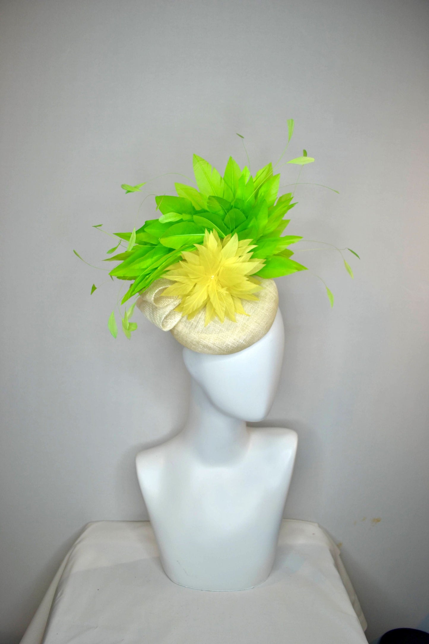 kentucky derby hat fascinator ivory sinamay base yellow feather flower with lime green feathers