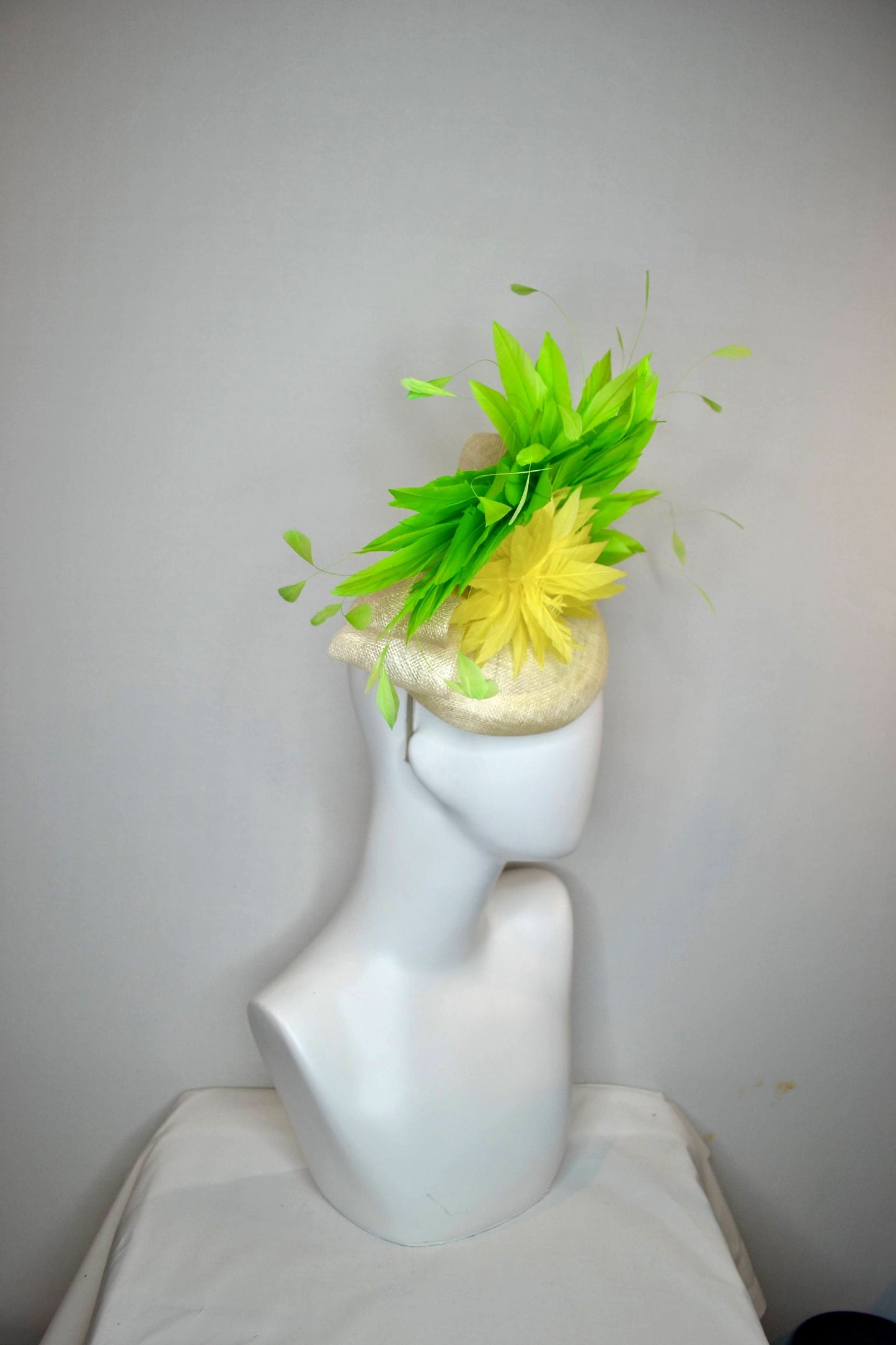 kentucky derby hat fascinator ivory sinamay base yellow feather flower with lime green feathers