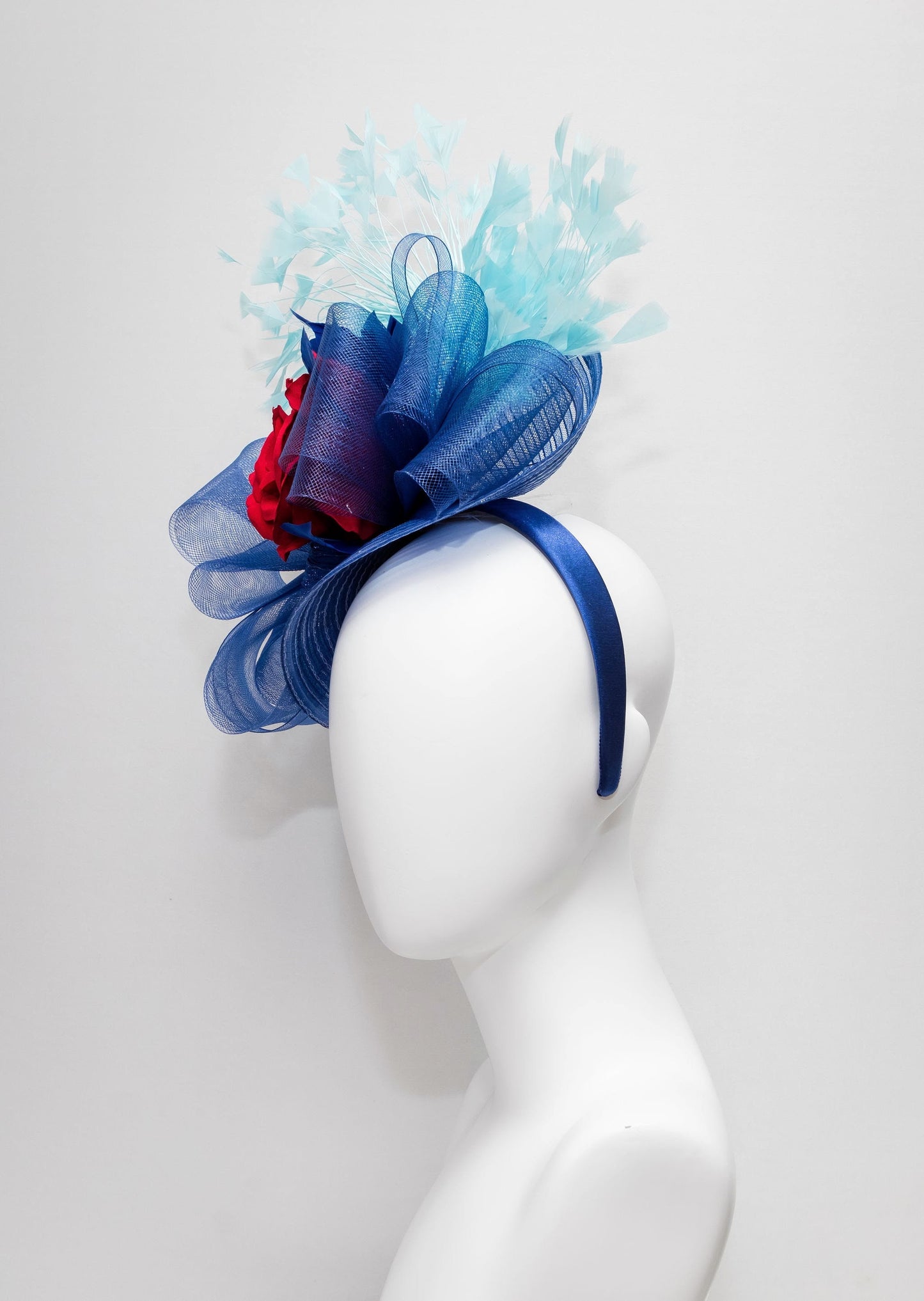 kentucky derby hat fascinator red rose flower with navy blue crinoline bow and aqua turquoise blue feather cascade