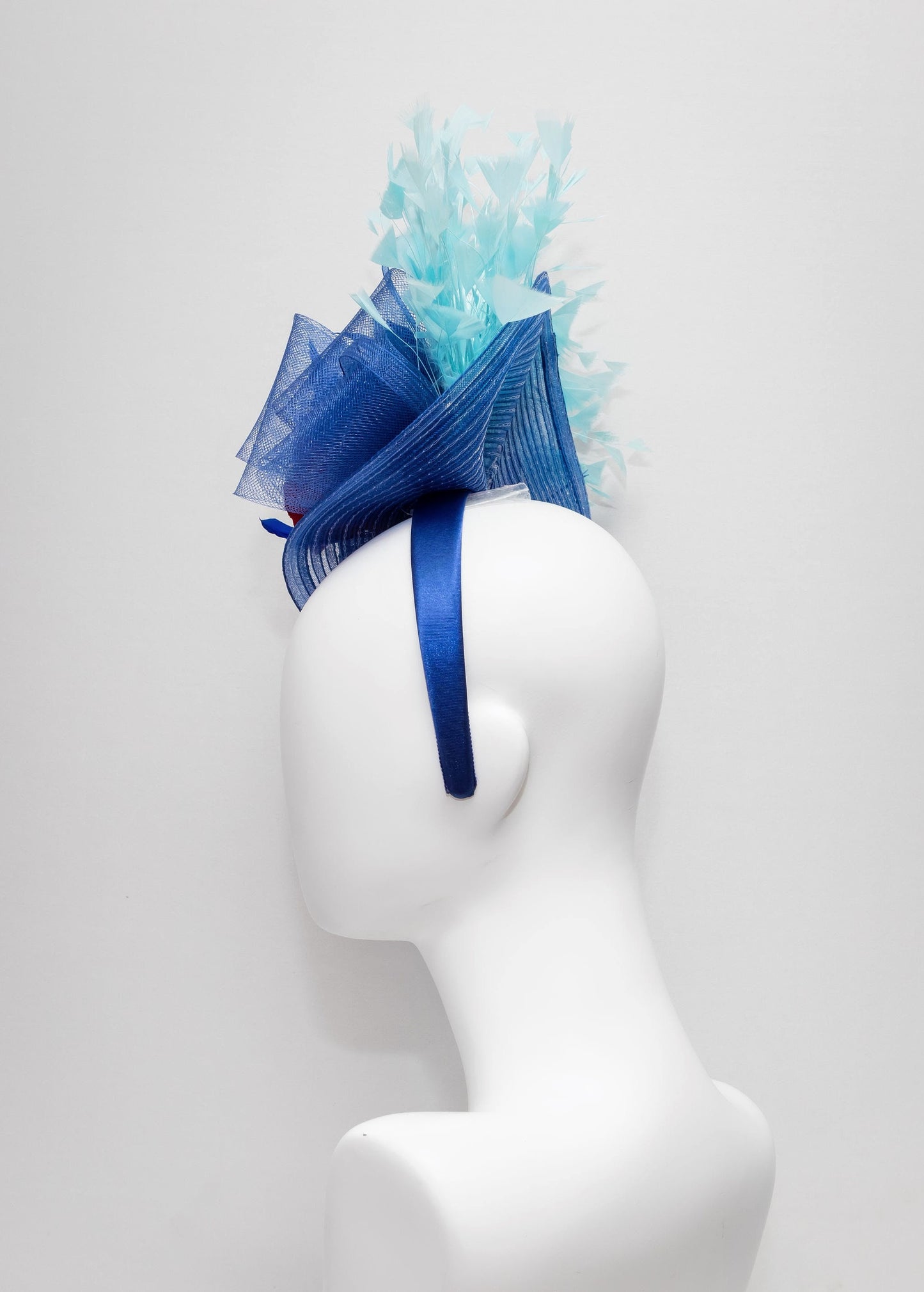 kentucky derby hat fascinator red rose flower with navy blue crinoline bow and aqua turquoise blue feather cascade