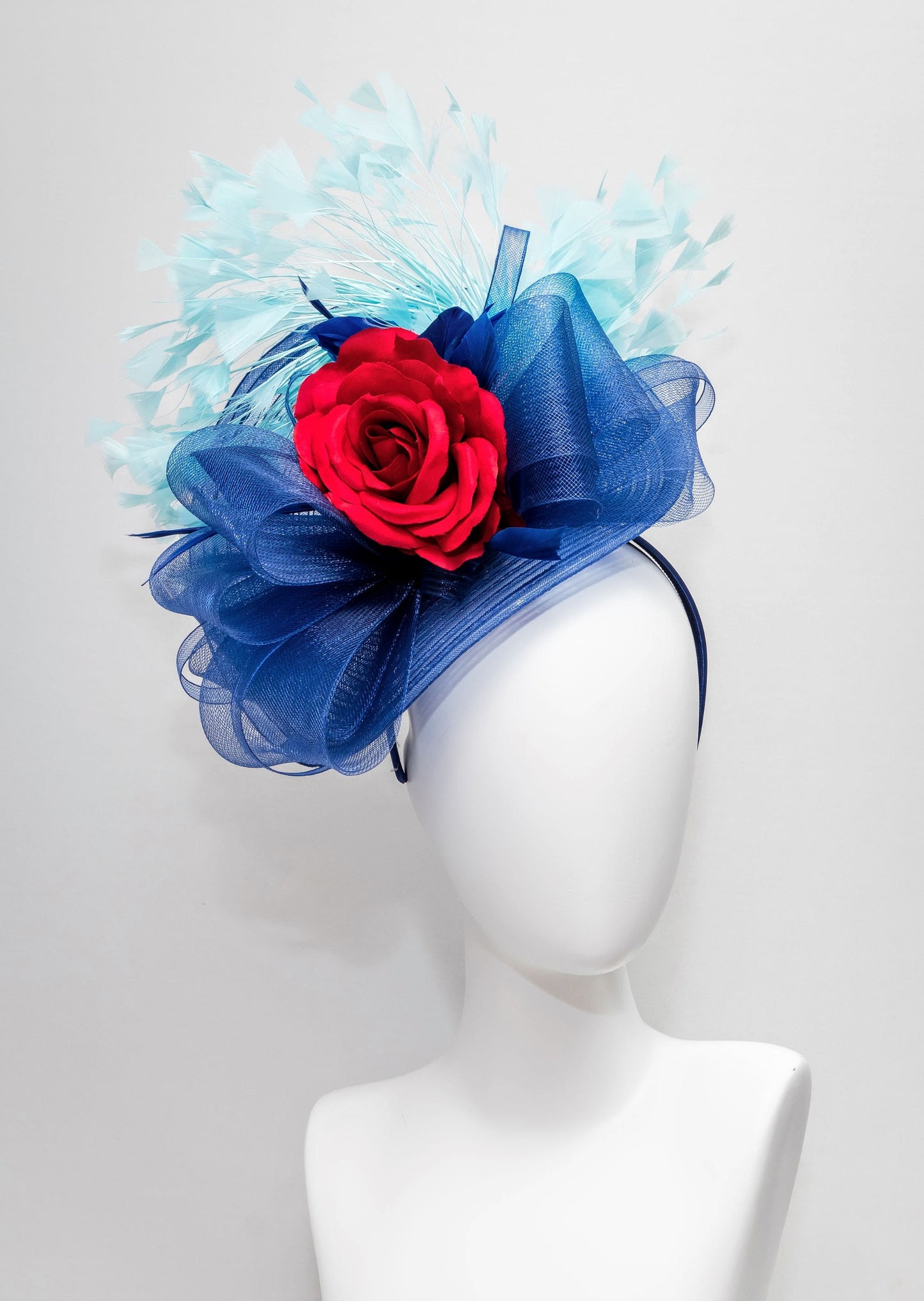 kentucky derby hat fascinator red rose flower with navy blue crinoline bow and aqua turquoise blue feather cascade