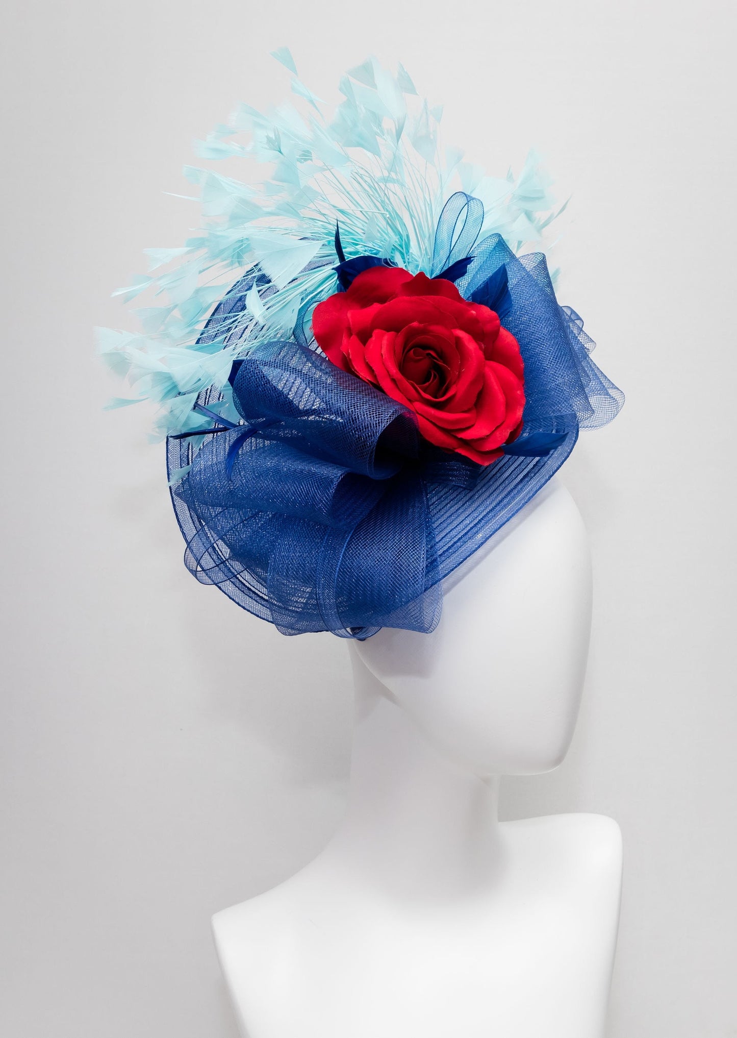 kentucky derby hat fascinator red rose flower with navy blue crinoline bow and aqua turquoise blue feather cascade