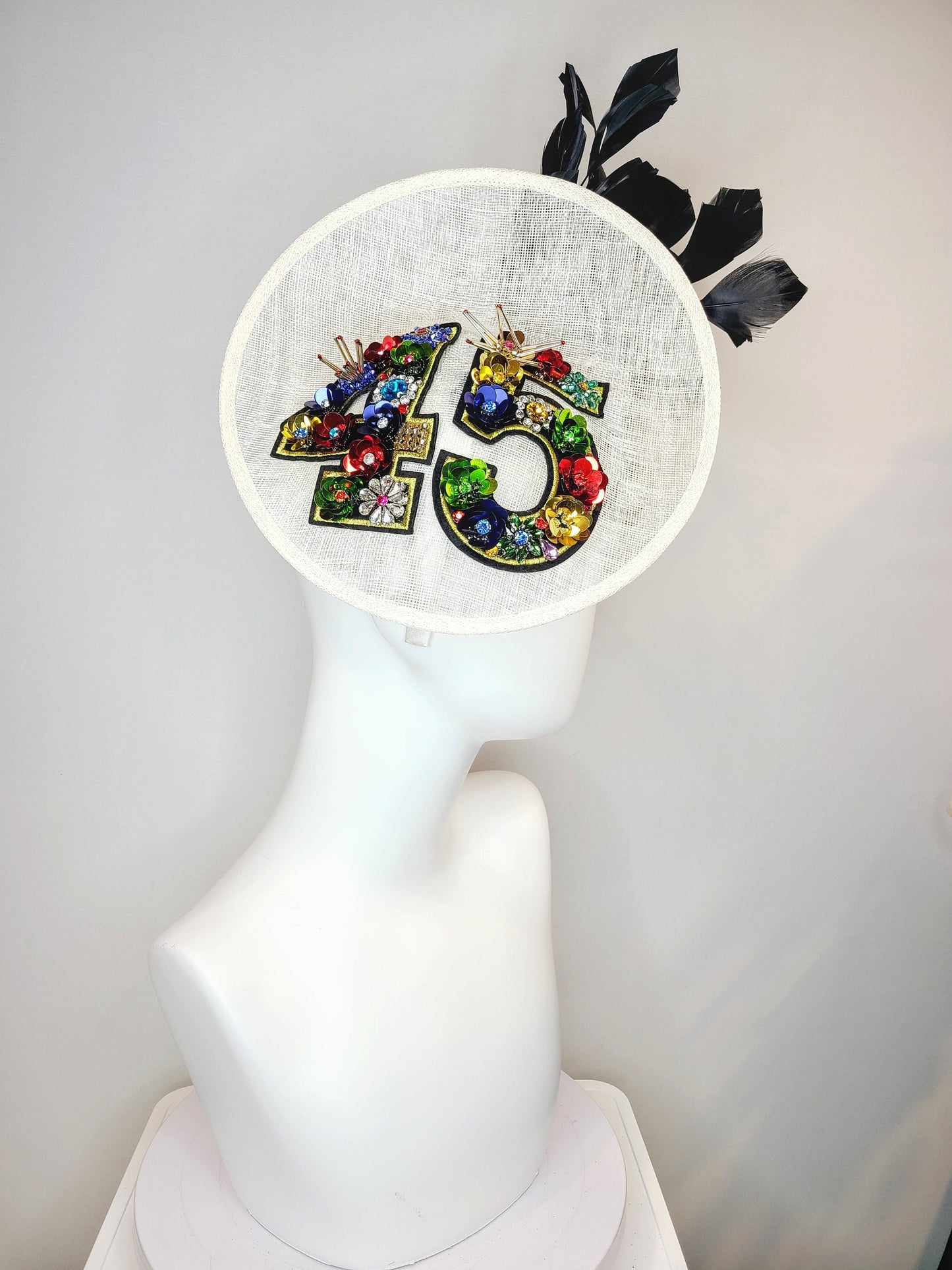 kentucky derby hat fascinator white sinamay saucer with crystal rhinestone jewel beaded rainbow colorful number 45 with large black feathers