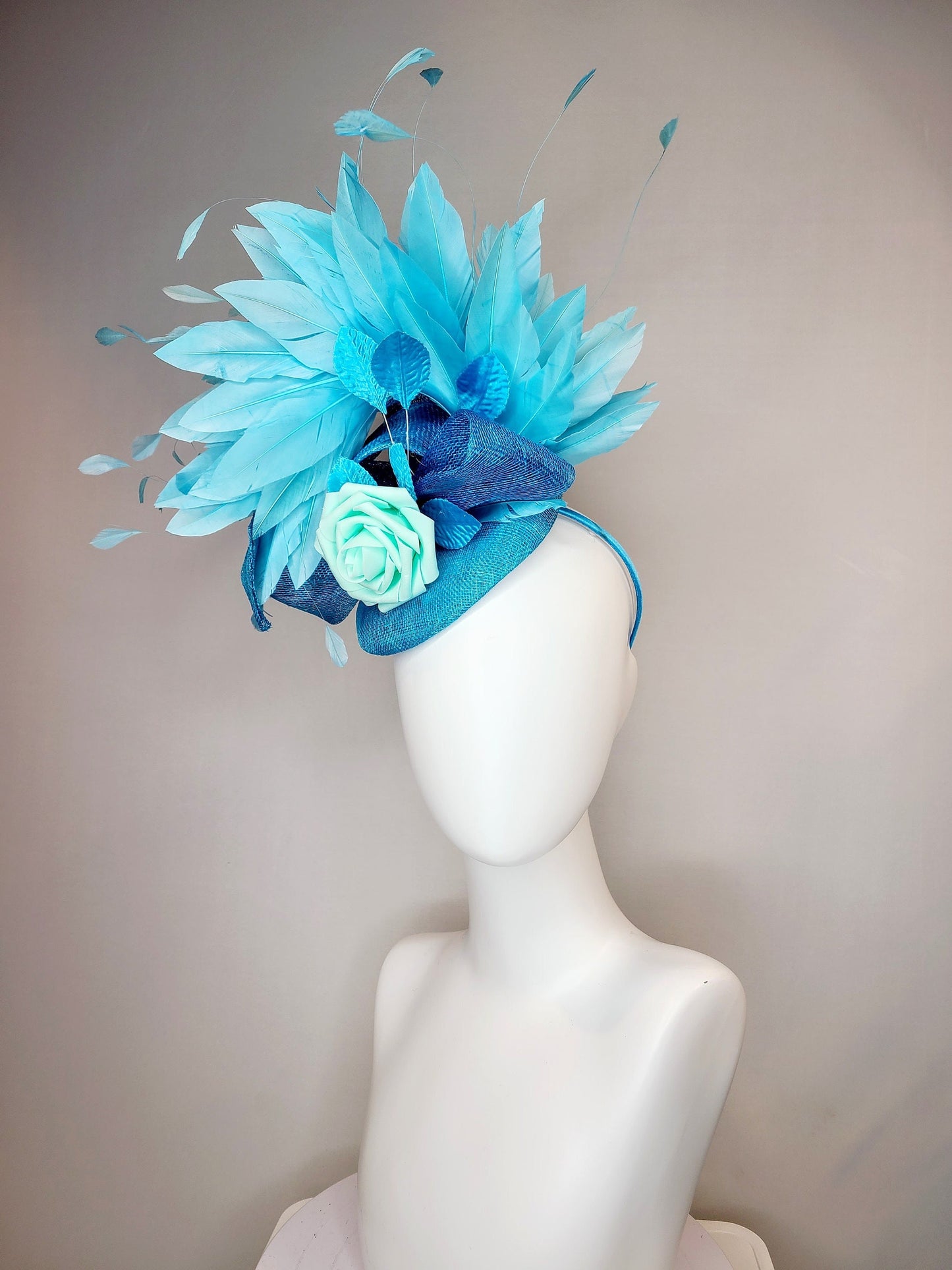 kentucky derby hat fascinator turquoise blue sinamay with bow and curls mint blue green rose blue leaves and blue aqua large feathers