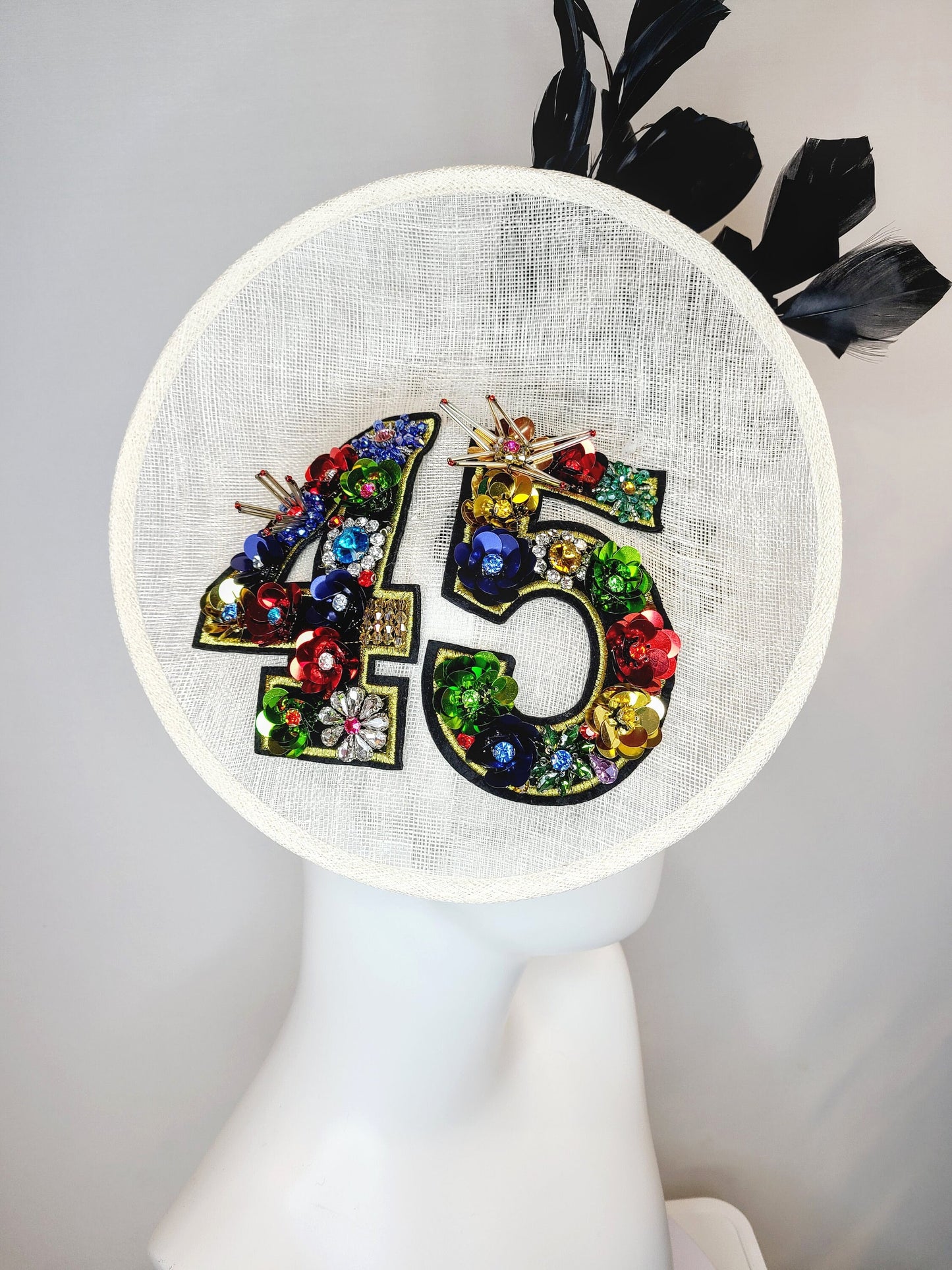 kentucky derby hat fascinator white sinamay saucer with crystal rhinestone jewel beaded rainbow colorful number 45 with large black feathers