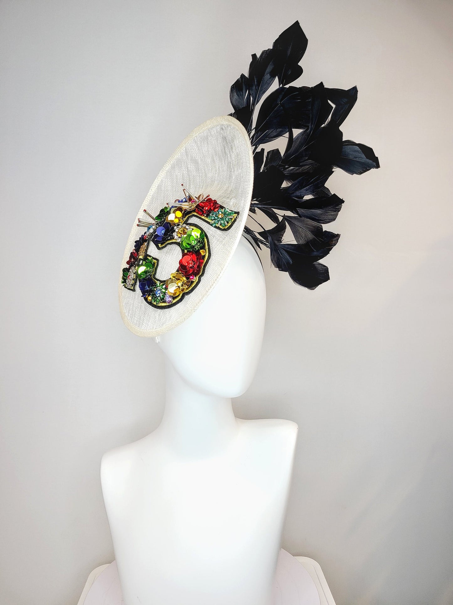 kentucky derby hat fascinator white sinamay saucer with crystal rhinestone jewel beaded rainbow colorful number 45 with large black feathers