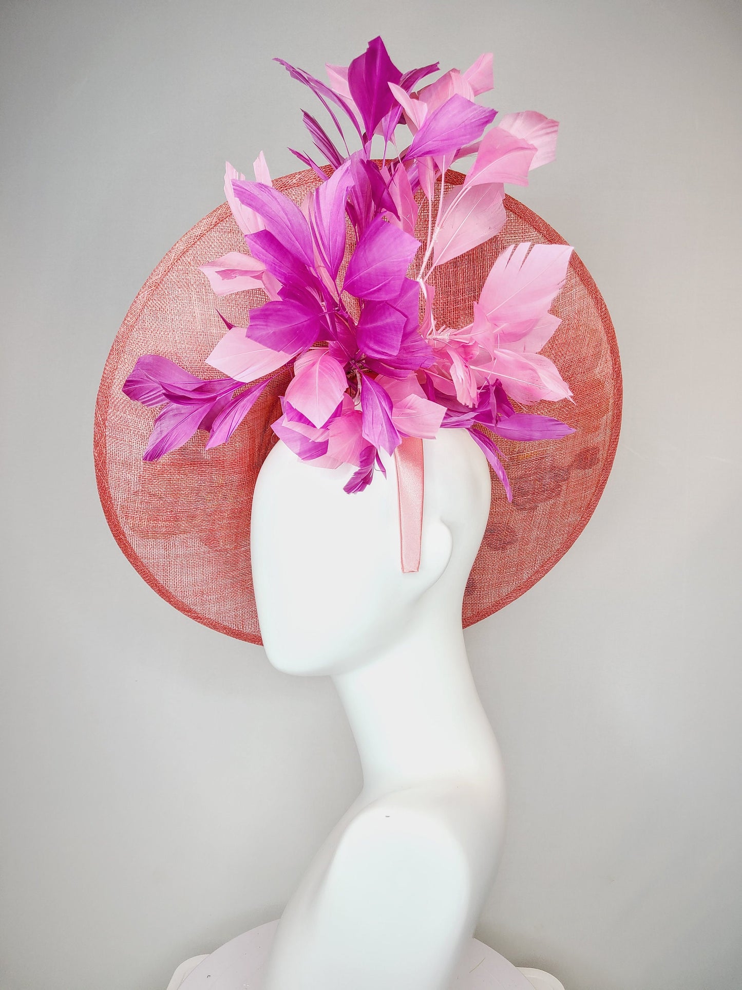 kentucky derby hat fascinator coral pink peach sinamay saucer fascinator with embroidered pink purple gold flowers with pink purple feathers