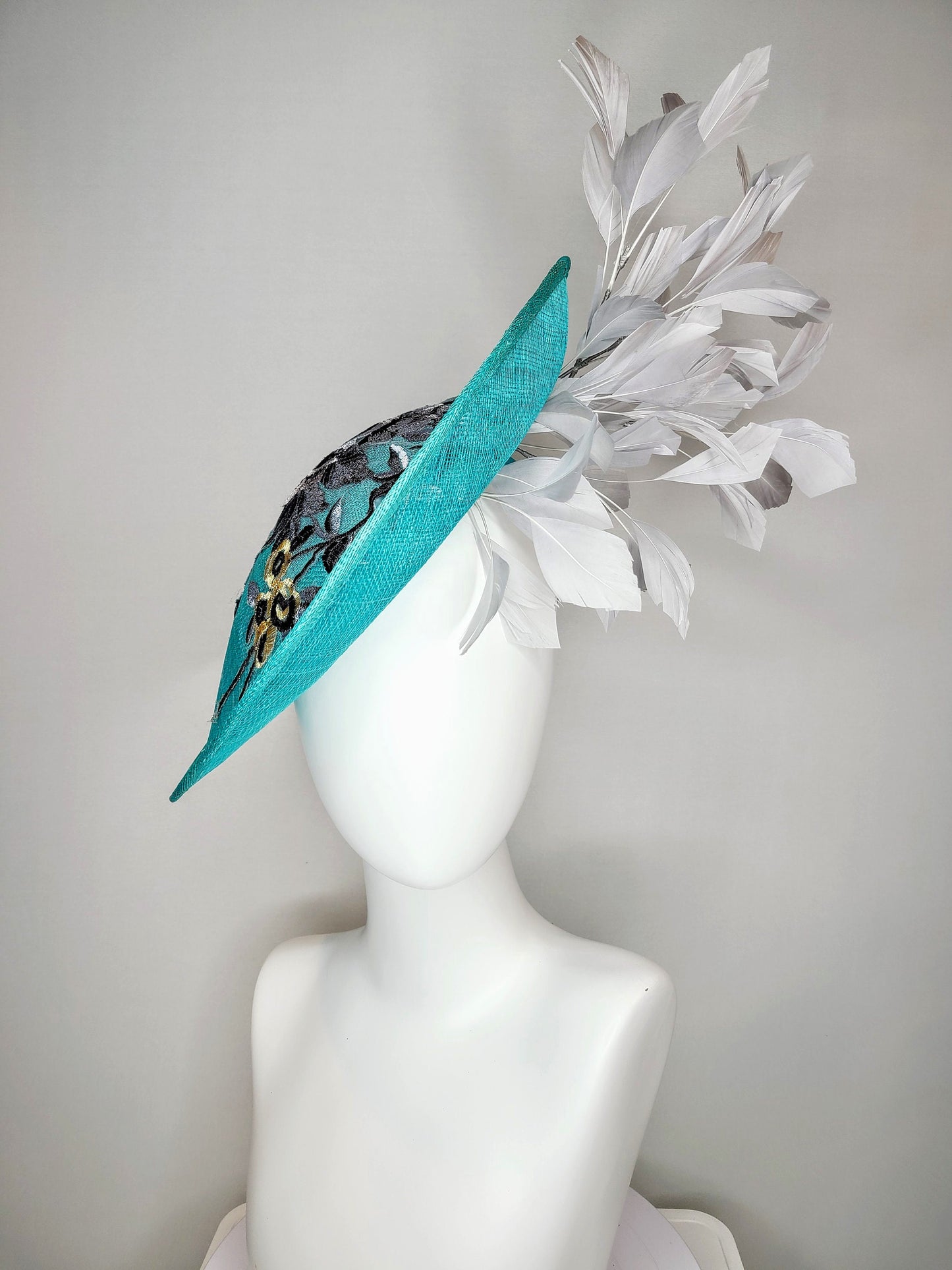 kentucky derby hat fascinator teal blue green sinamay saucer with silver gray black embroidered flowers with silver gray feathers