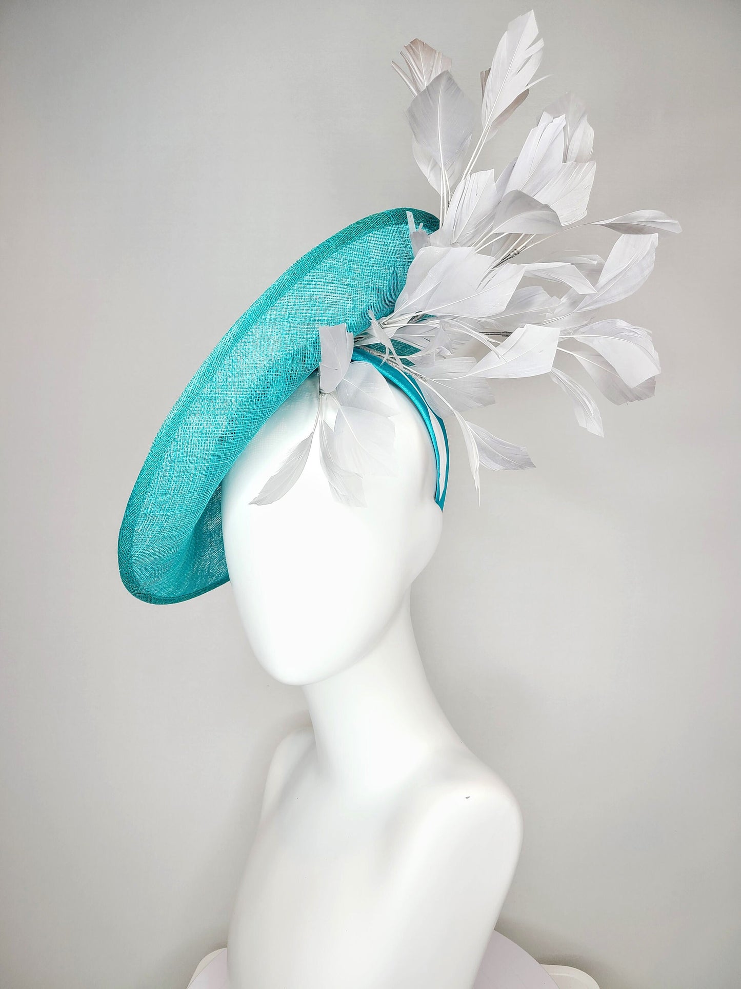 kentucky derby hat fascinator teal blue green sinamay saucer with silver gray black embroidered flowers with silver gray feathers