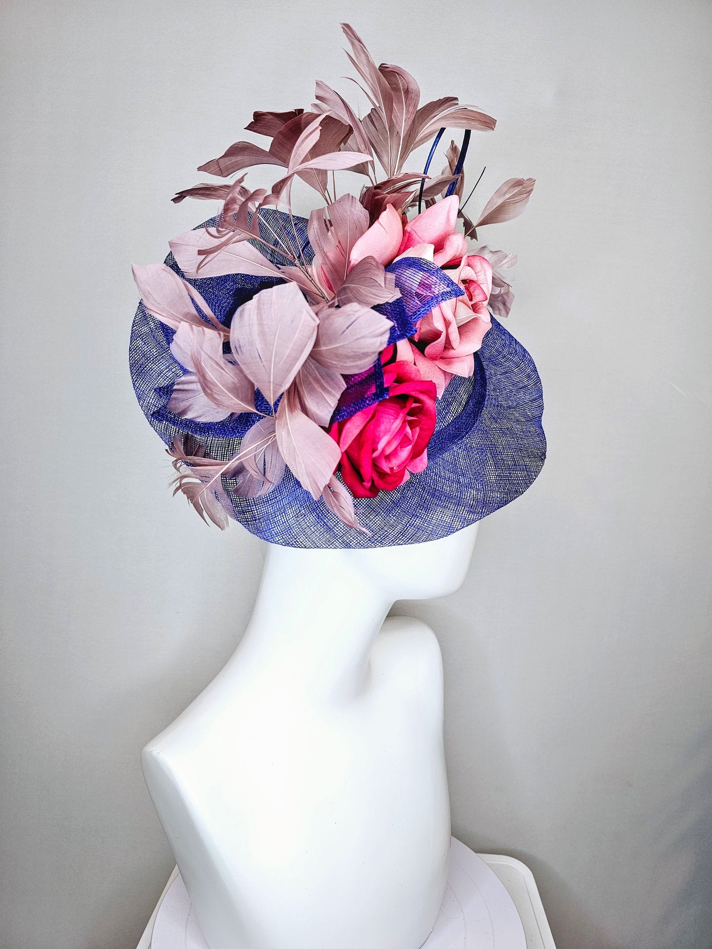 kentucky derby hat fascinator royal blue sinamay with light pink blush and bright dark pink roses with taupe feather decor