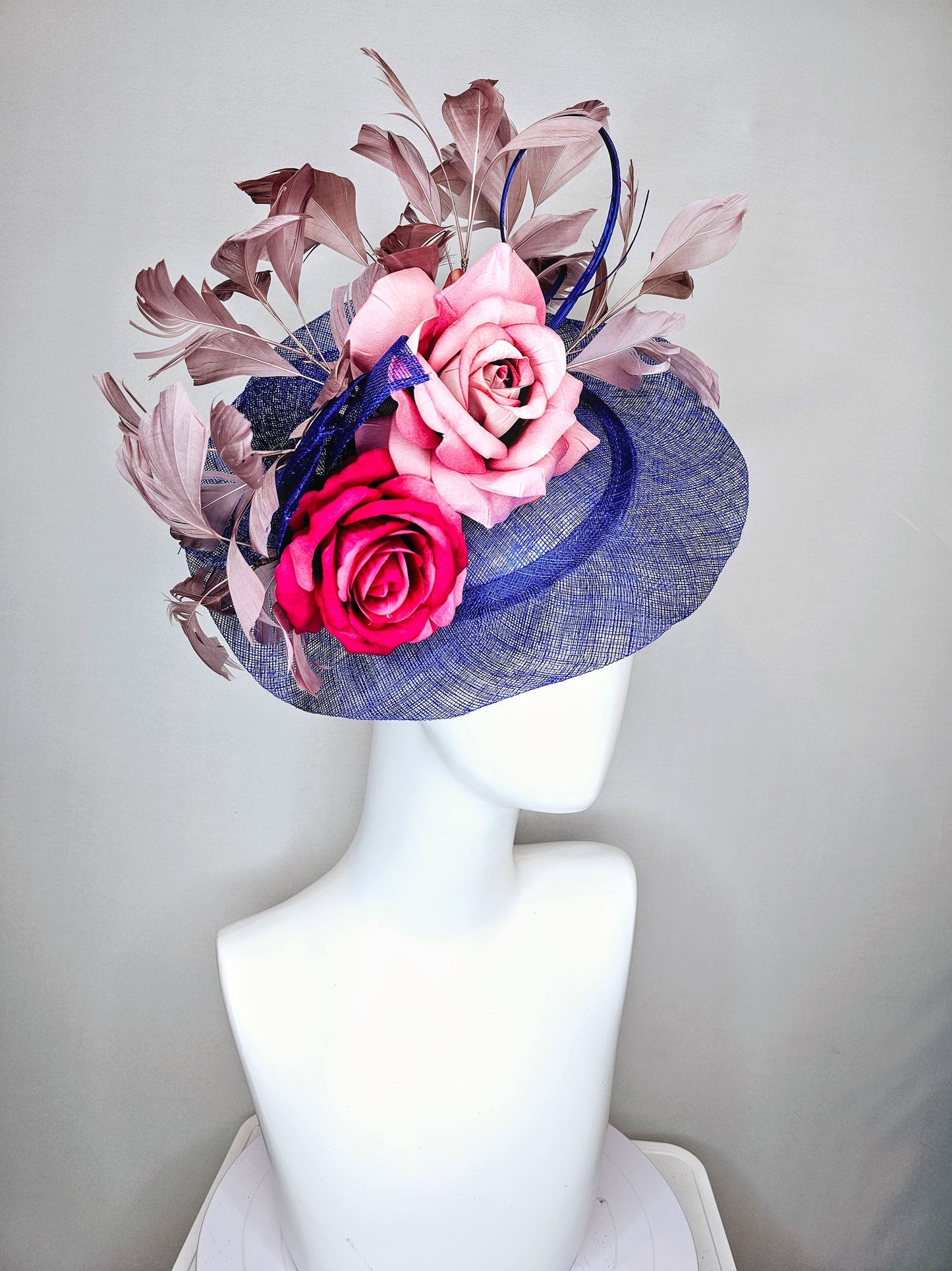kentucky derby hat fascinator royal blue sinamay with light pink blush and bright dark pink roses with taupe feather decor