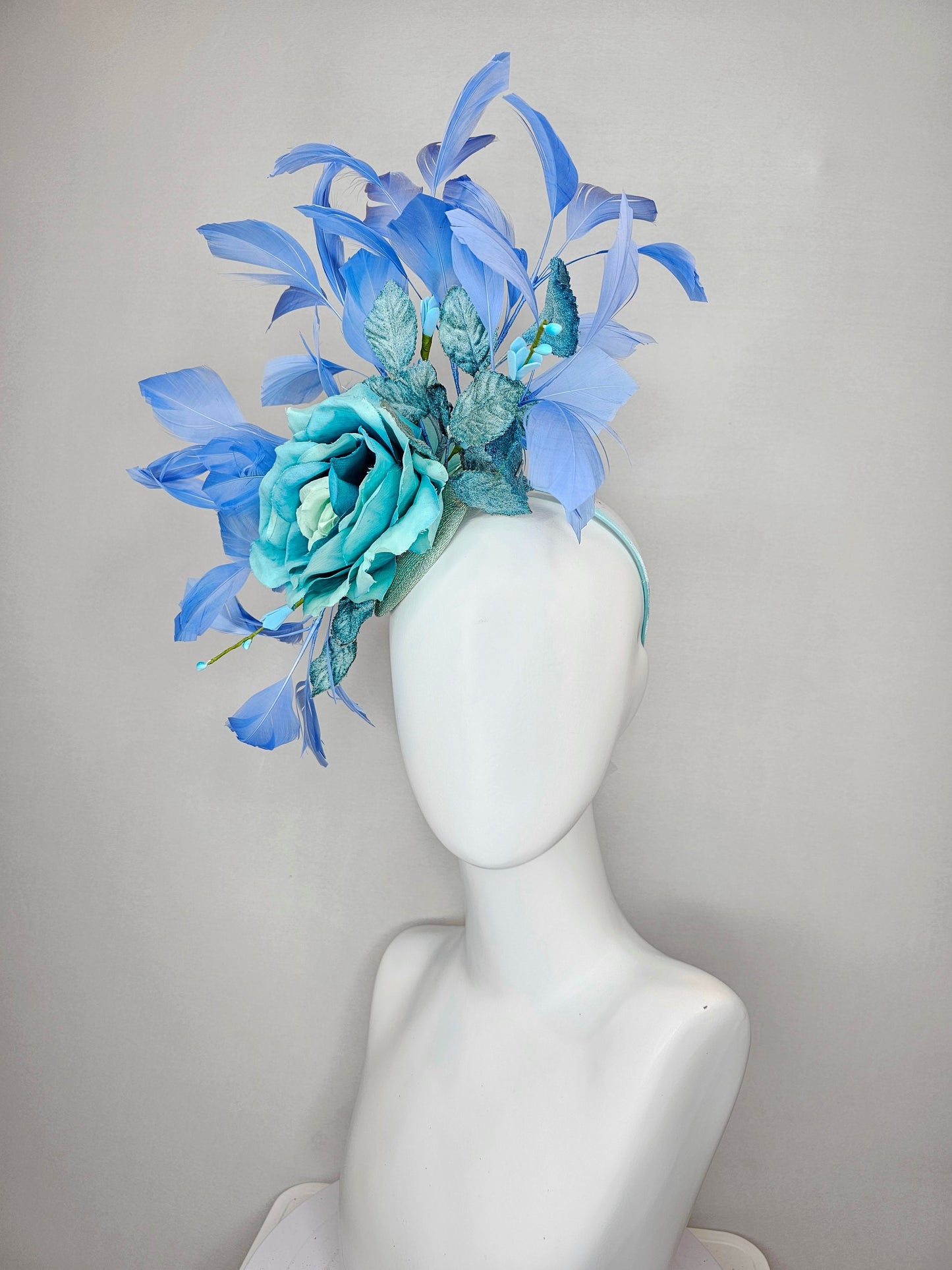 kentucky derby hat fascinator blue teal ombre rose with branching blue feathers and blue velvet leaves