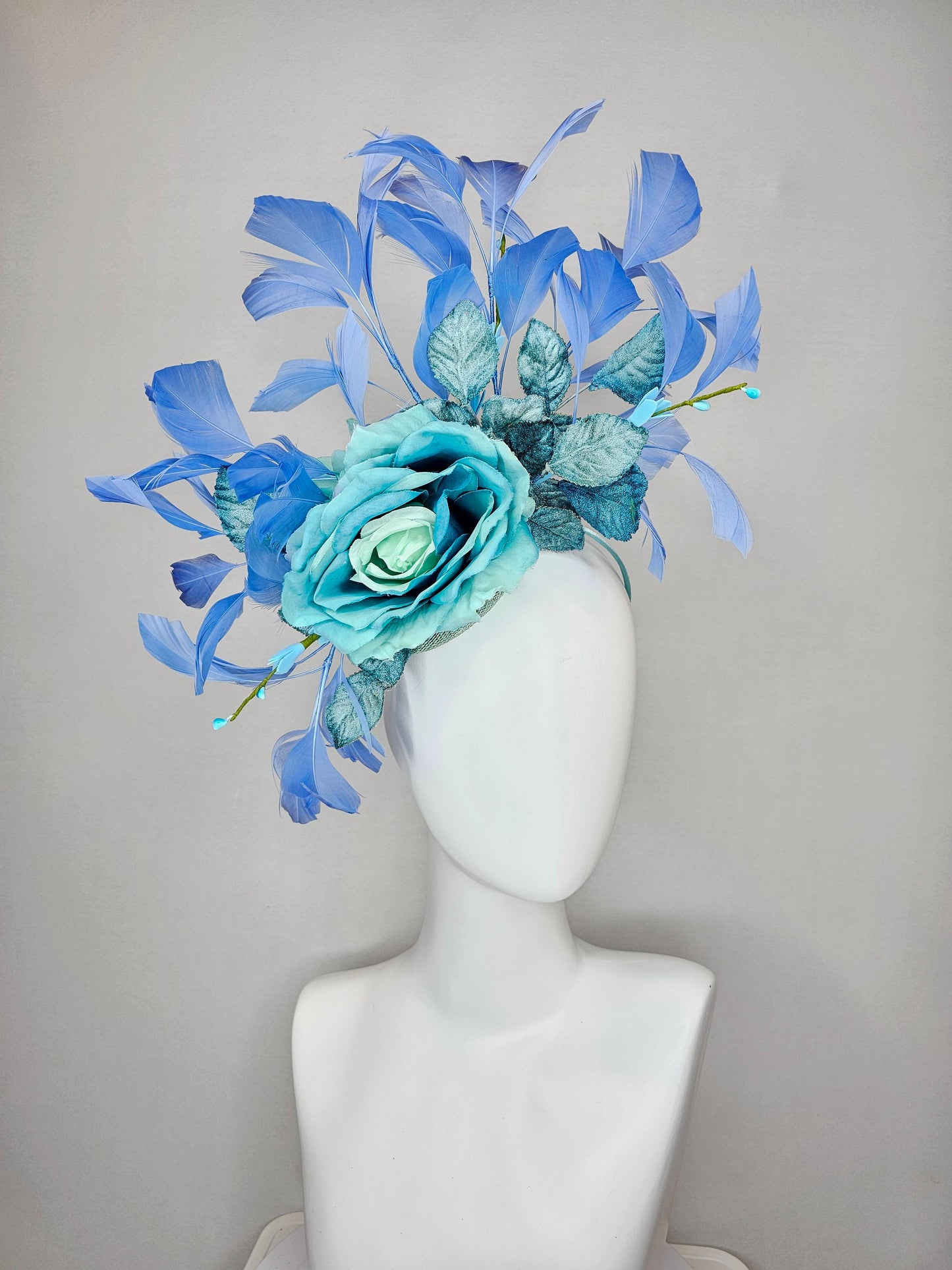 kentucky derby hat fascinator blue teal ombre rose with branching blue feathers and blue velvet leaves
