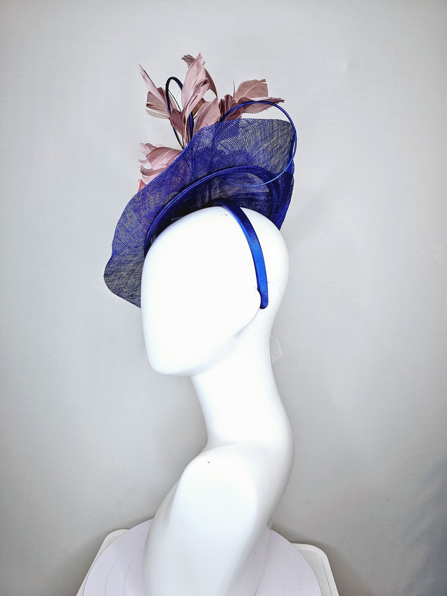 kentucky derby hat fascinator royal blue sinamay with light pink blush and bright dark pink roses with taupe feather decor