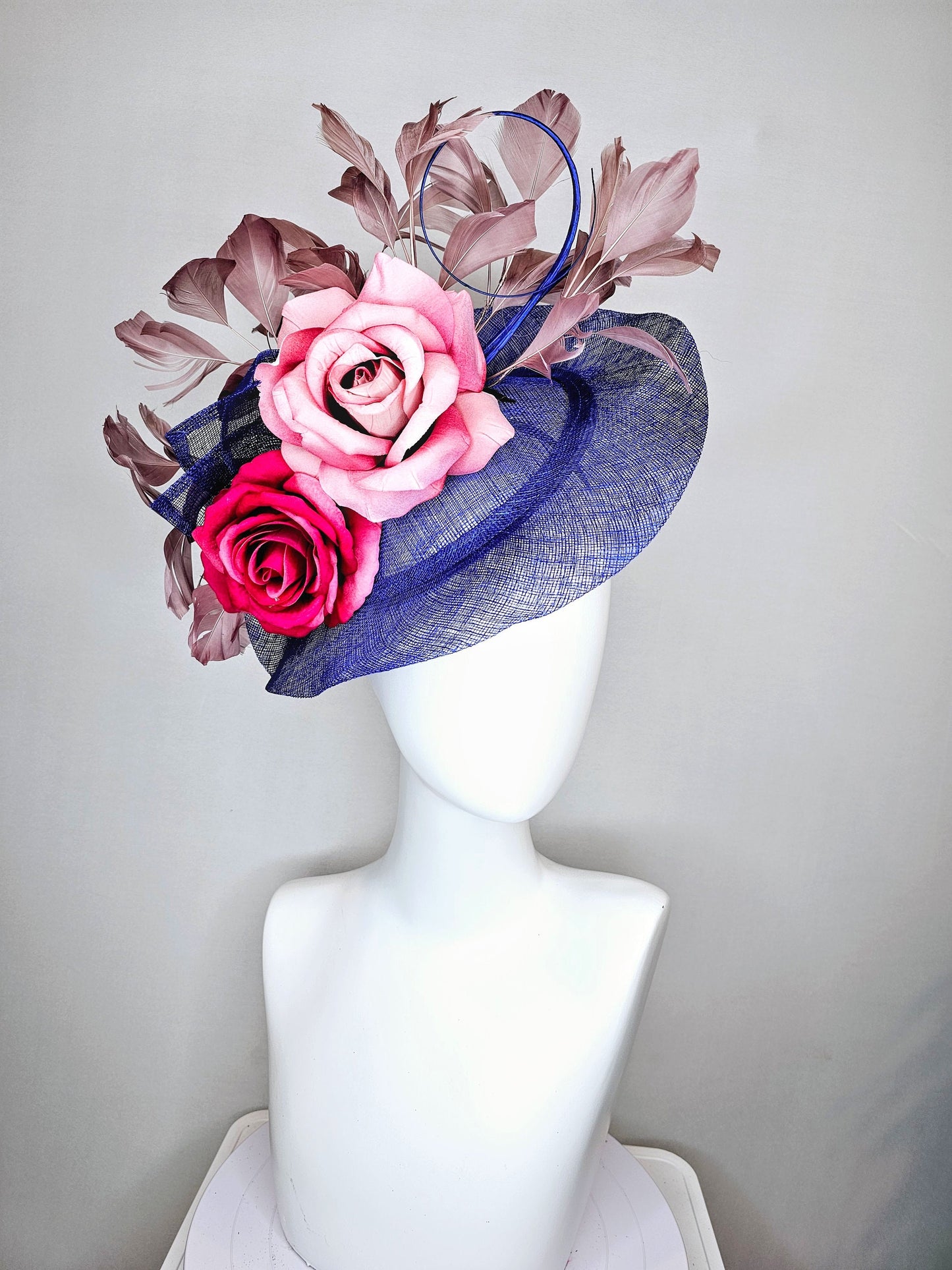 kentucky derby hat fascinator royal blue sinamay with light pink blush and bright dark pink roses with taupe feather decor
