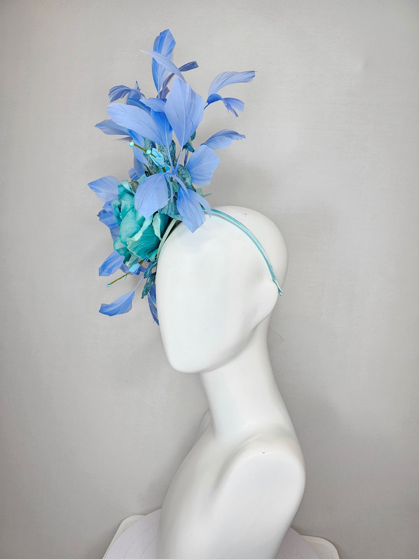 kentucky derby hat fascinator blue teal ombre rose with branching blue feathers and blue velvet leaves
