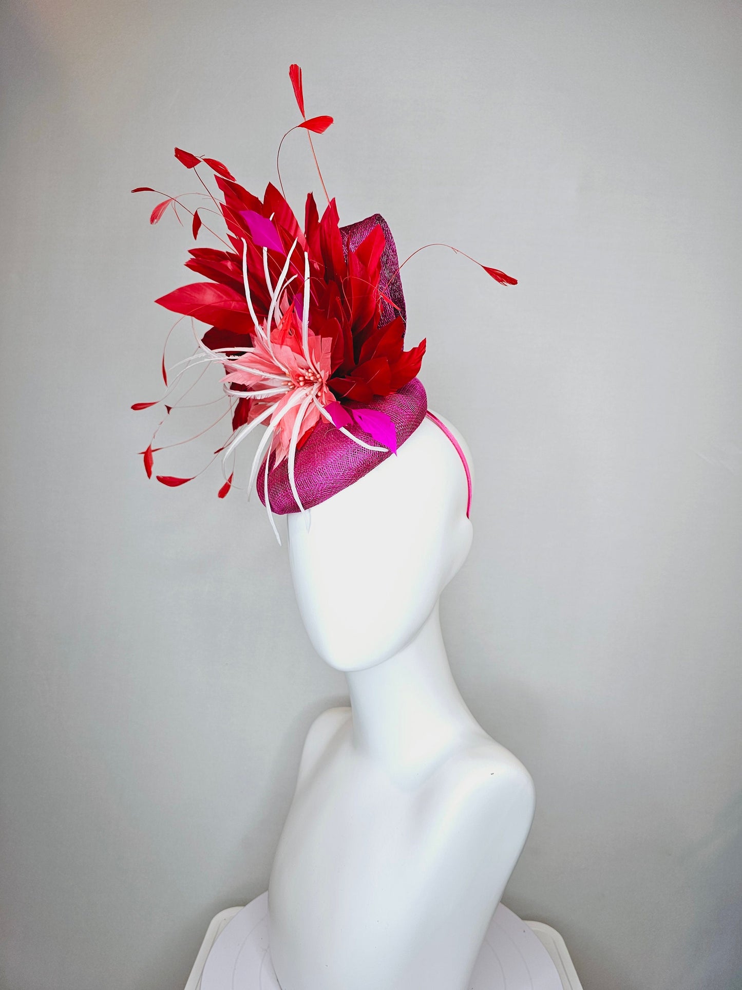 kentucky derby hat fascinator purple magenta sinamay with coral orange and white feather flowers with bright red feathers