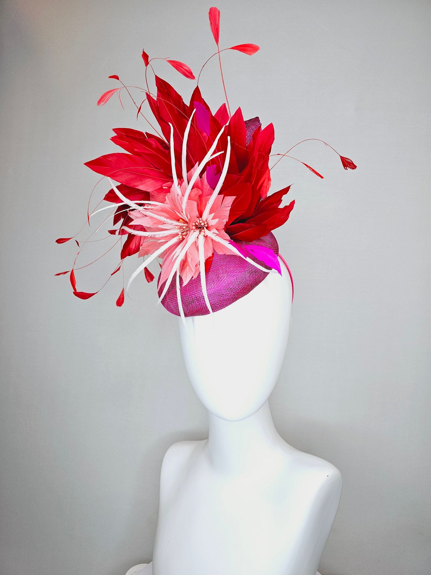 kentucky derby hat fascinator purple magenta sinamay with coral orange and white feather flowers with bright red feathers