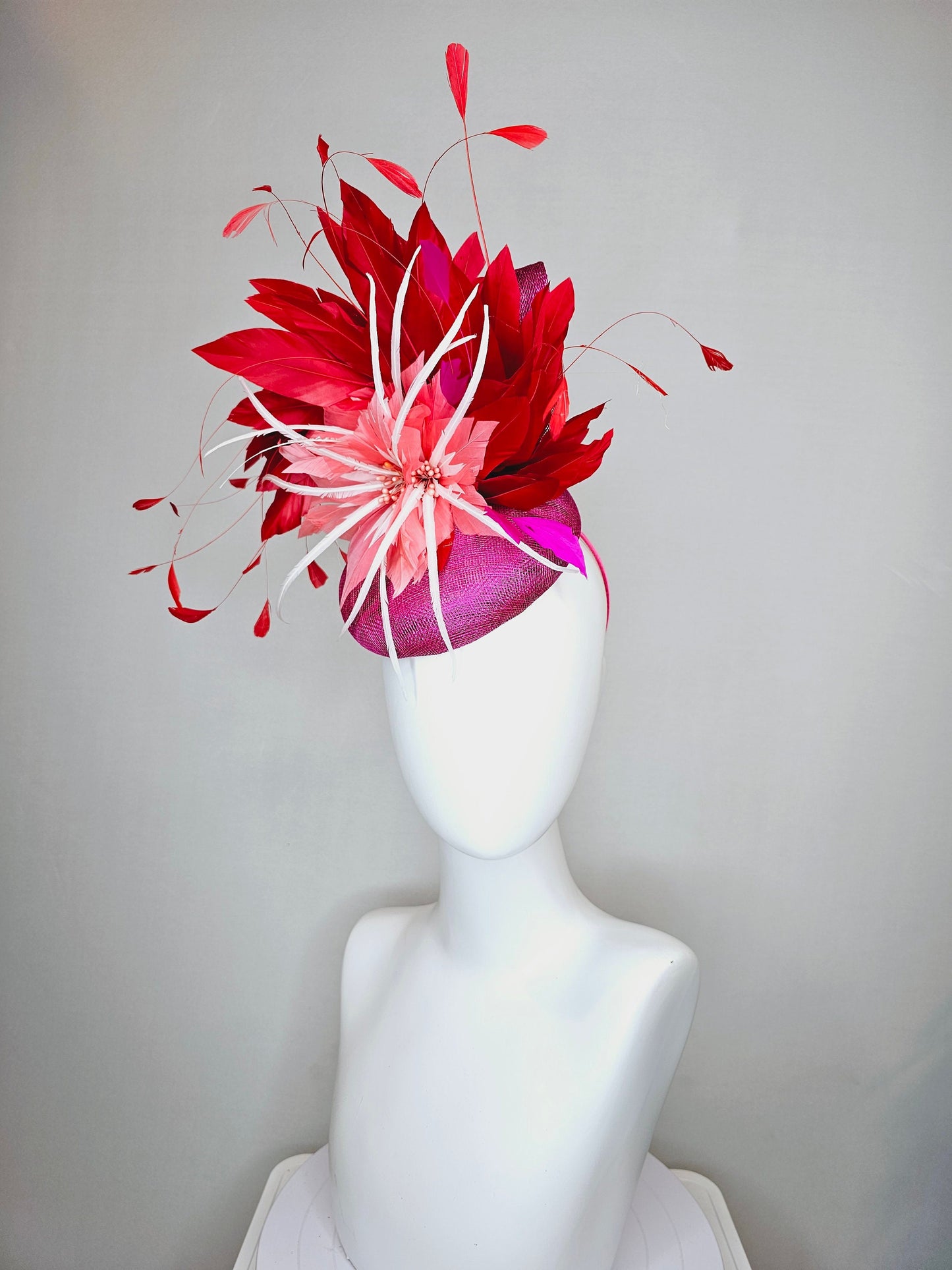 kentucky derby hat fascinator purple magenta sinamay with coral orange and white feather flowers with bright red feathers