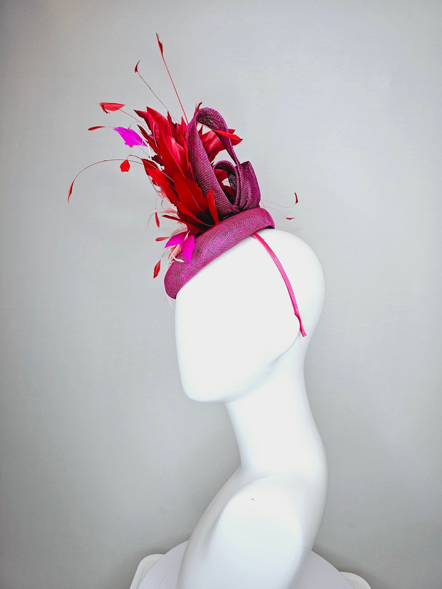 kentucky derby hat fascinator purple magenta sinamay with coral orange and white feather flowers with bright red feathers