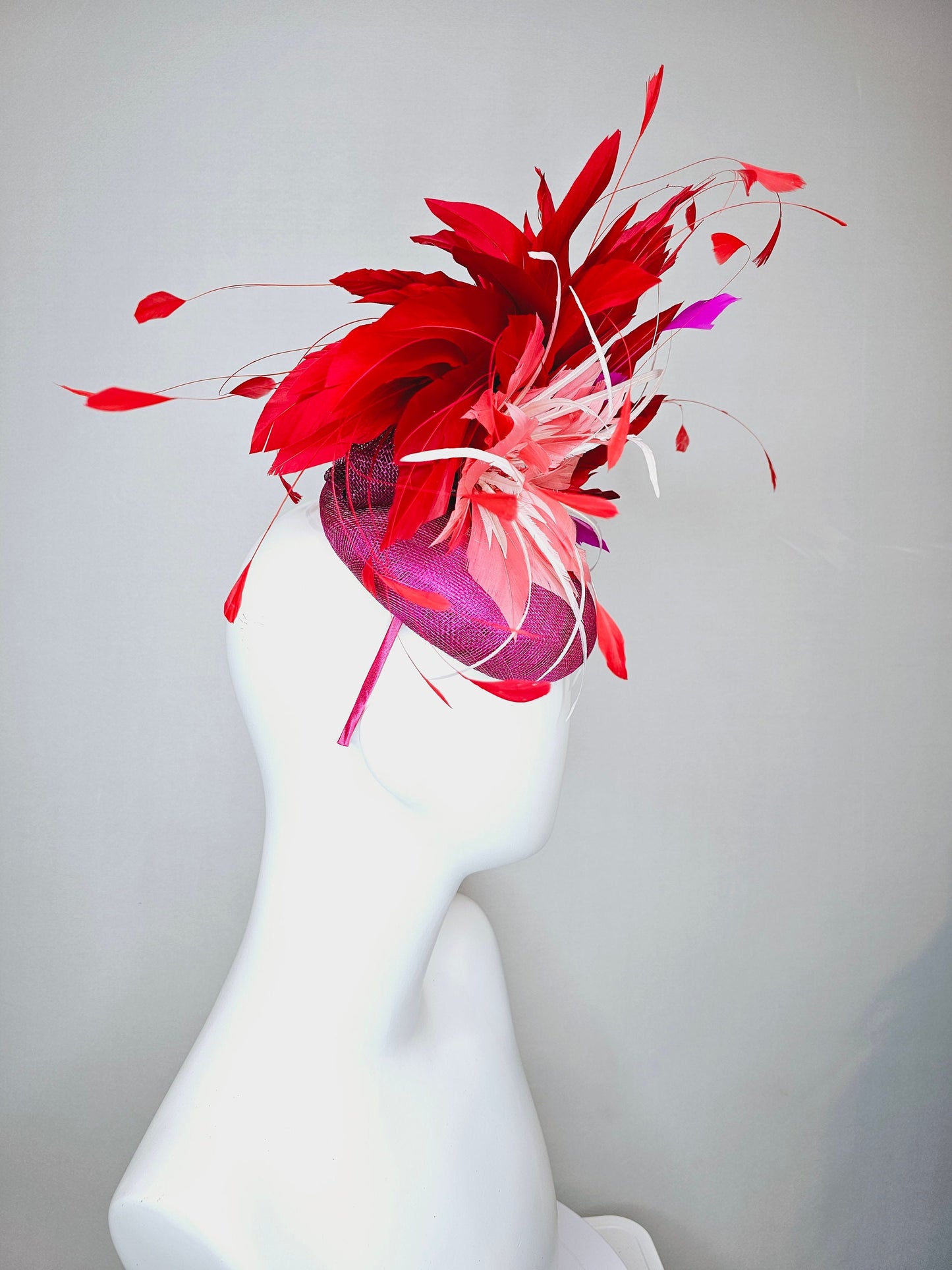 kentucky derby hat fascinator purple magenta sinamay with coral orange and white feather flowers with bright red feathers