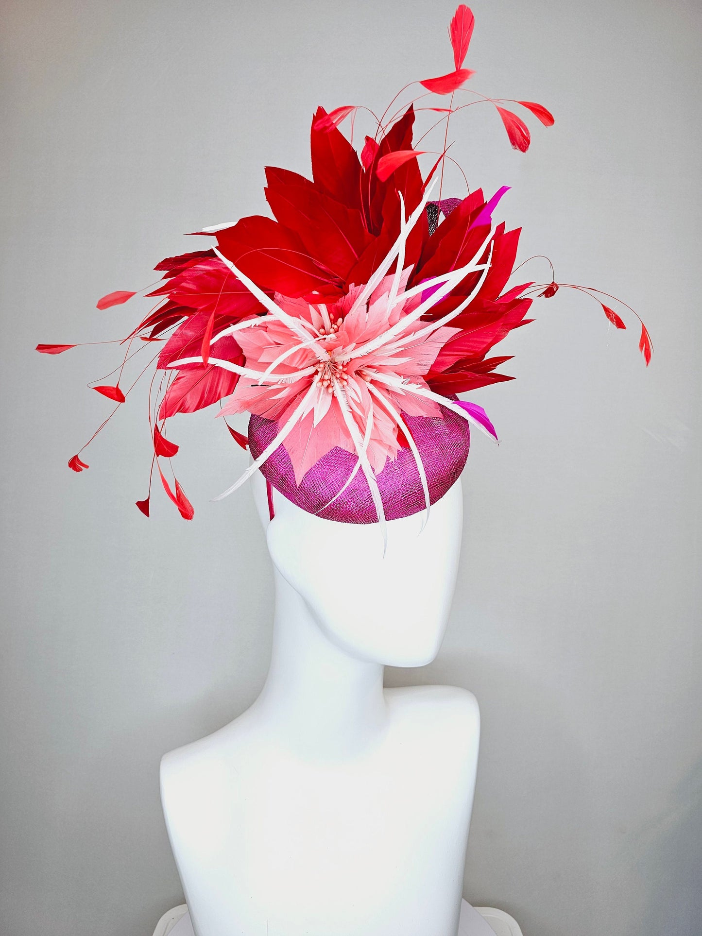 kentucky derby hat fascinator purple magenta sinamay with coral orange and white feather flowers with bright red feathers