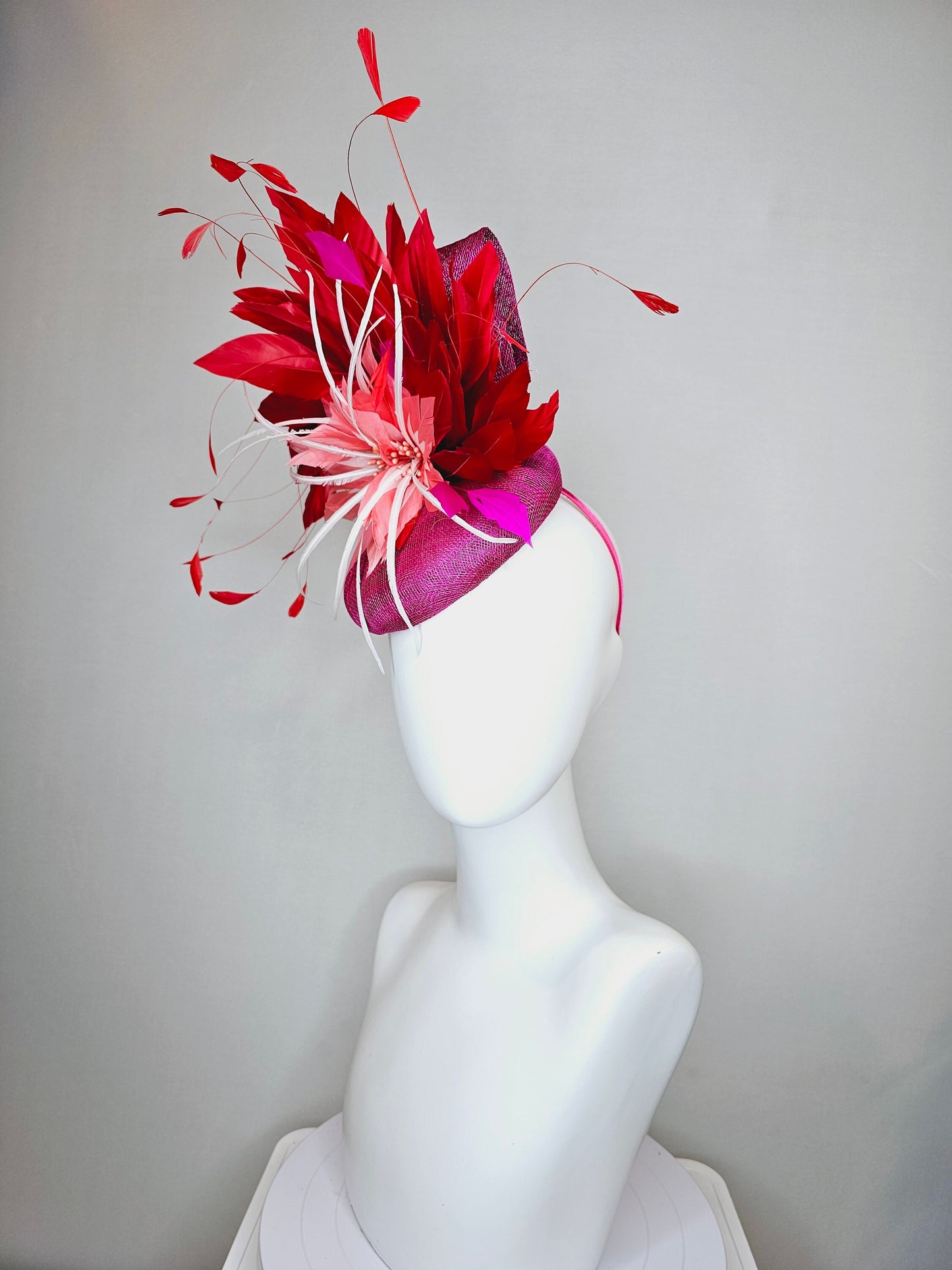 kentucky derby hat fascinator purple magenta sinamay with coral orange and white feather flowers with bright red feathers