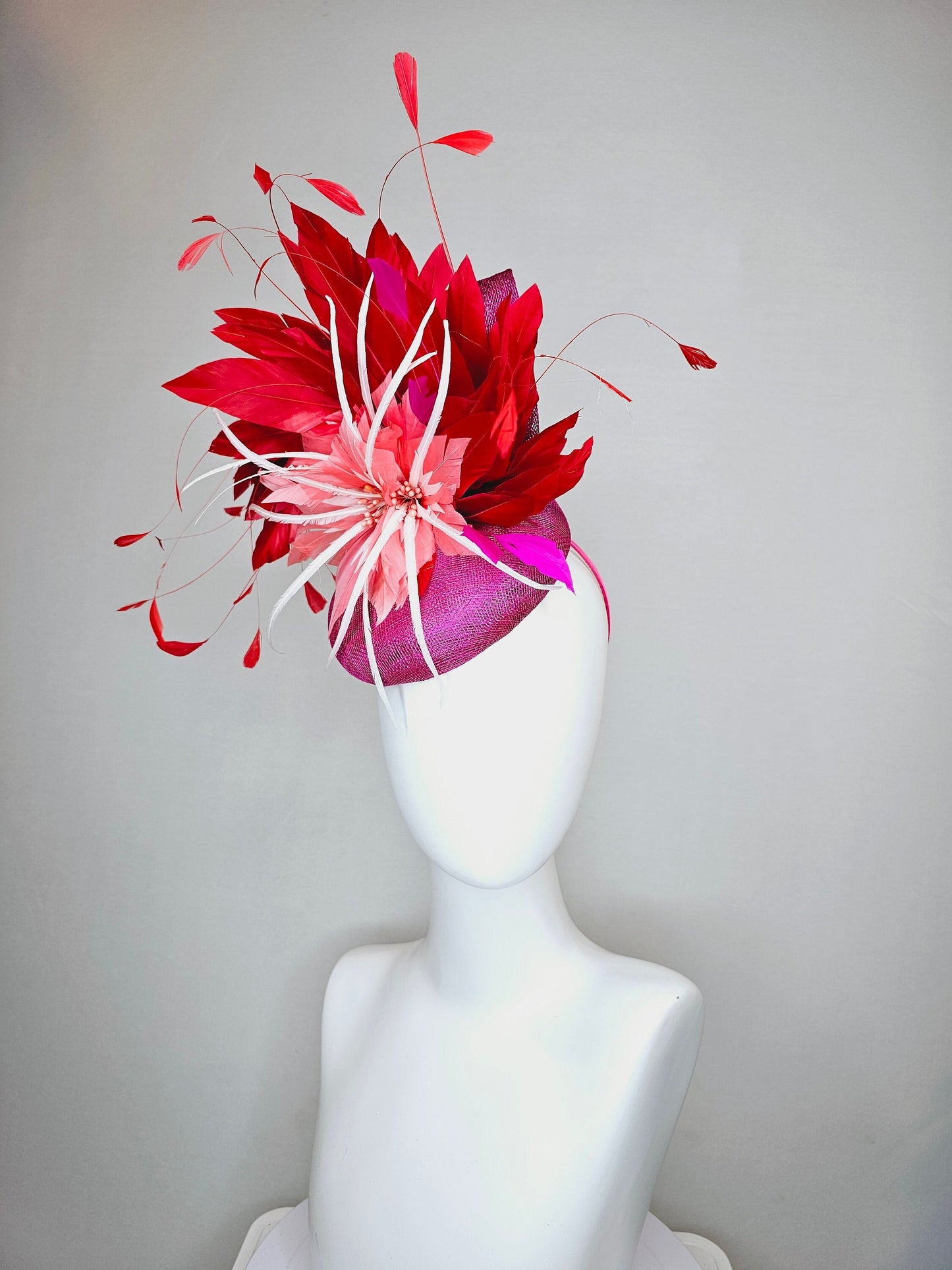 kentucky derby hat fascinator purple magenta sinamay with coral orange and white feather flowers with bright red feathers