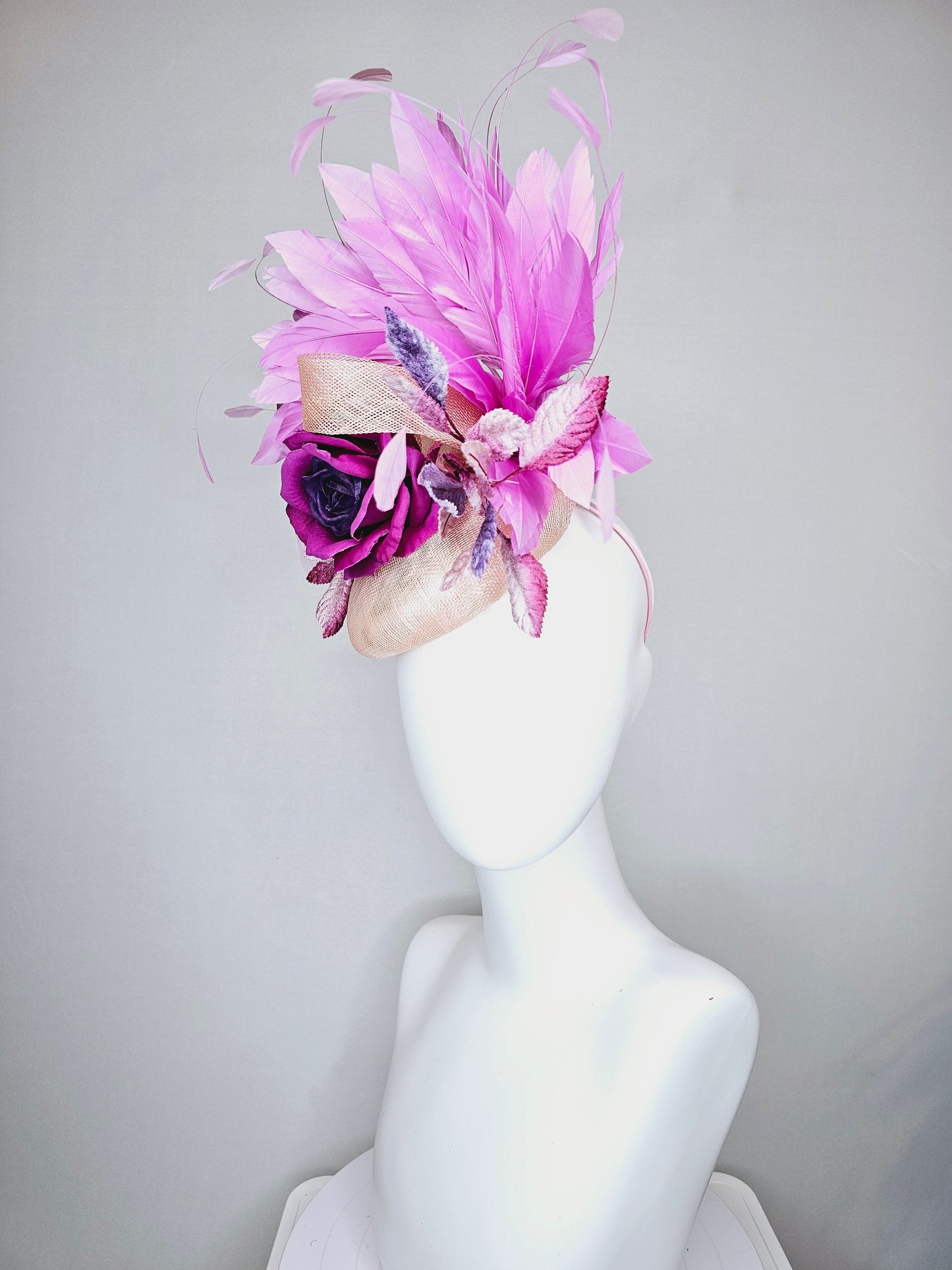 kentucky derby hat fascinator light pink blush beige sinamay with purple rose and pink purple feathers and purple violet velvet leaves
