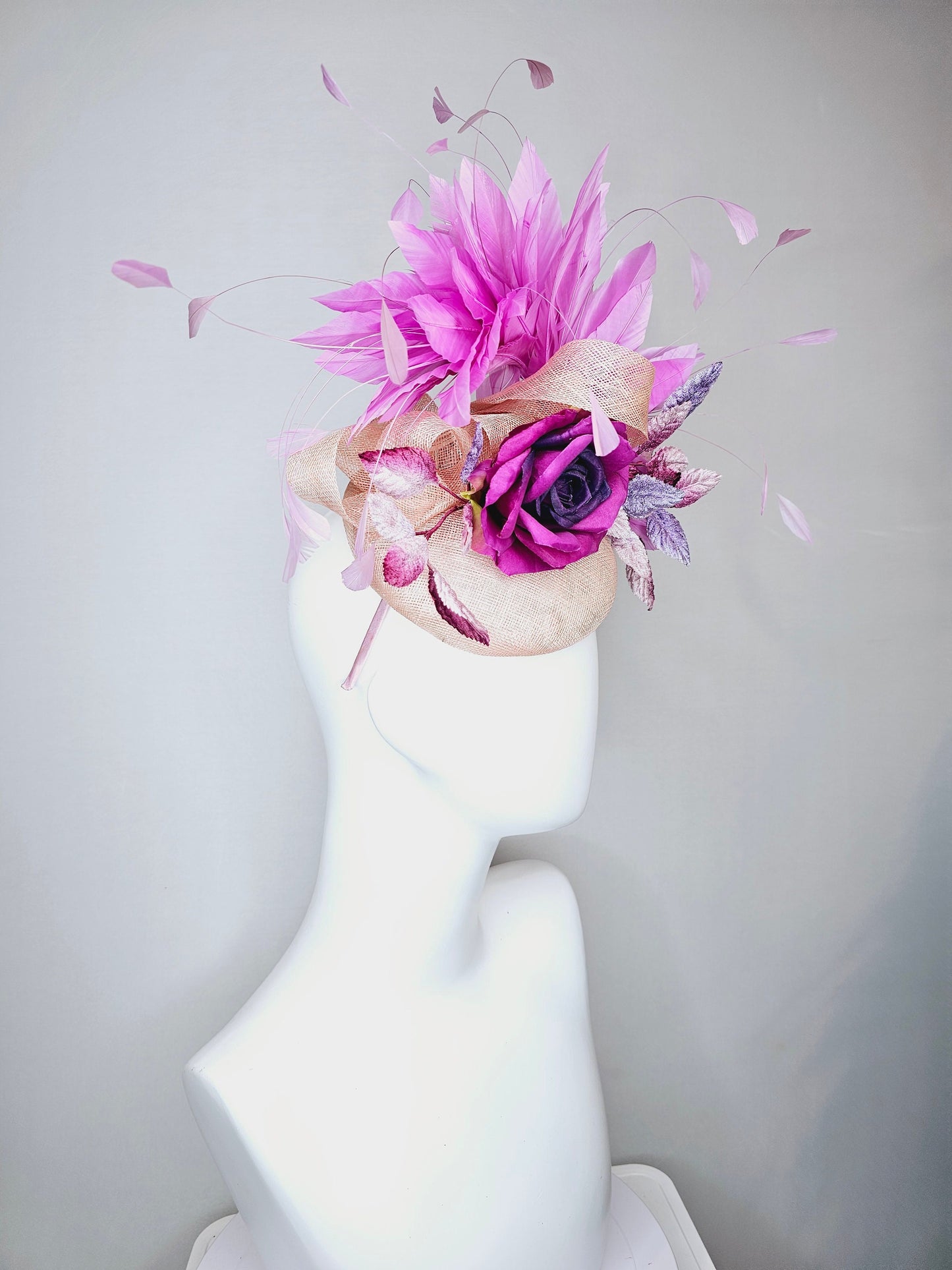 kentucky derby hat fascinator light pink blush beige sinamay with purple rose and pink purple feathers and purple violet velvet leaves
