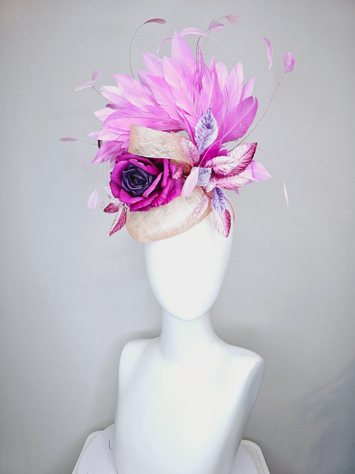 kentucky derby hat fascinator light pink blush beige sinamay with purple rose and pink purple feathers and purple violet velvet leaves