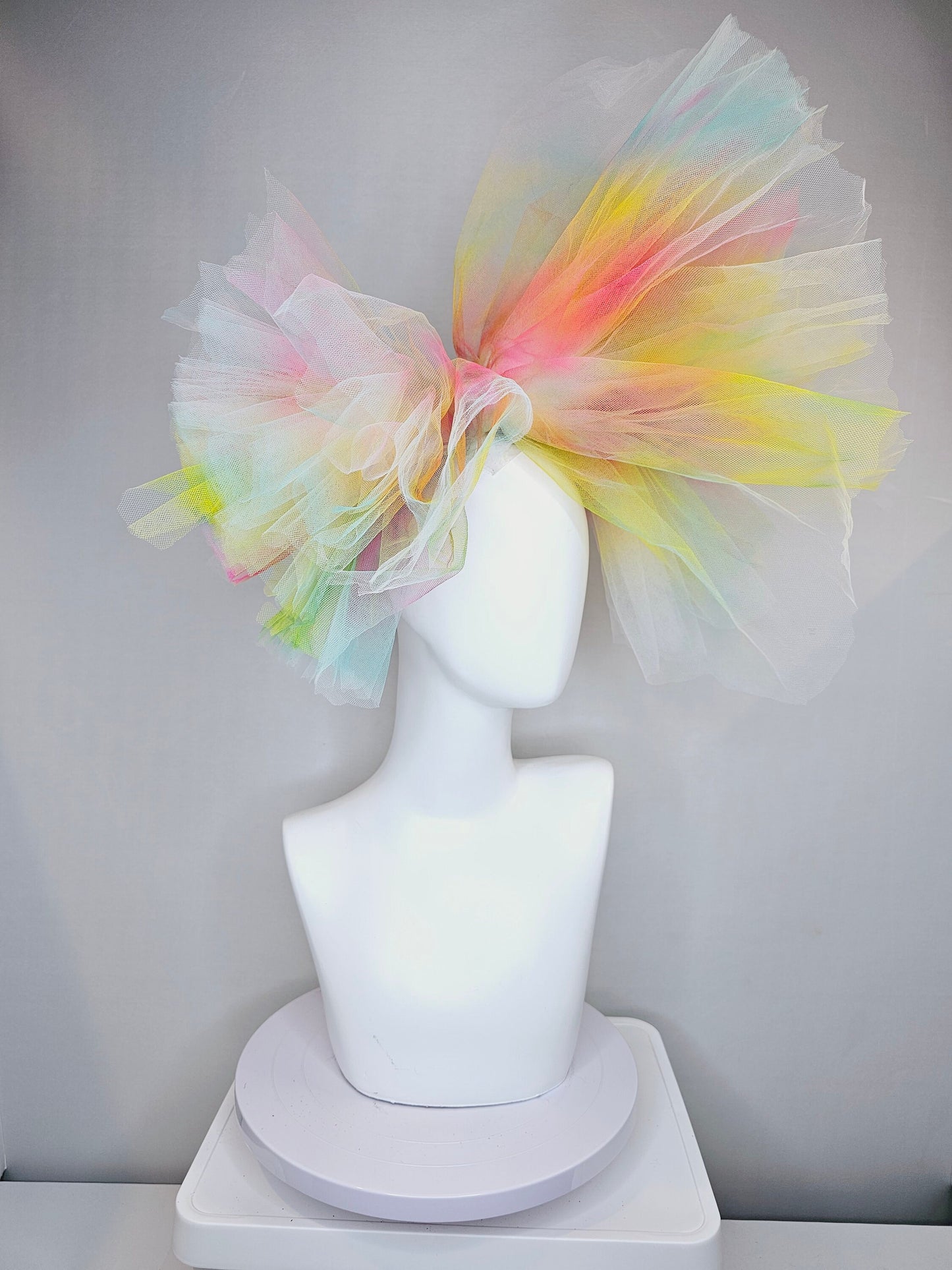 kentucky derby hat fascinator very large netting colorful distressed tulle rainbow sheer asymmetric bow on headband