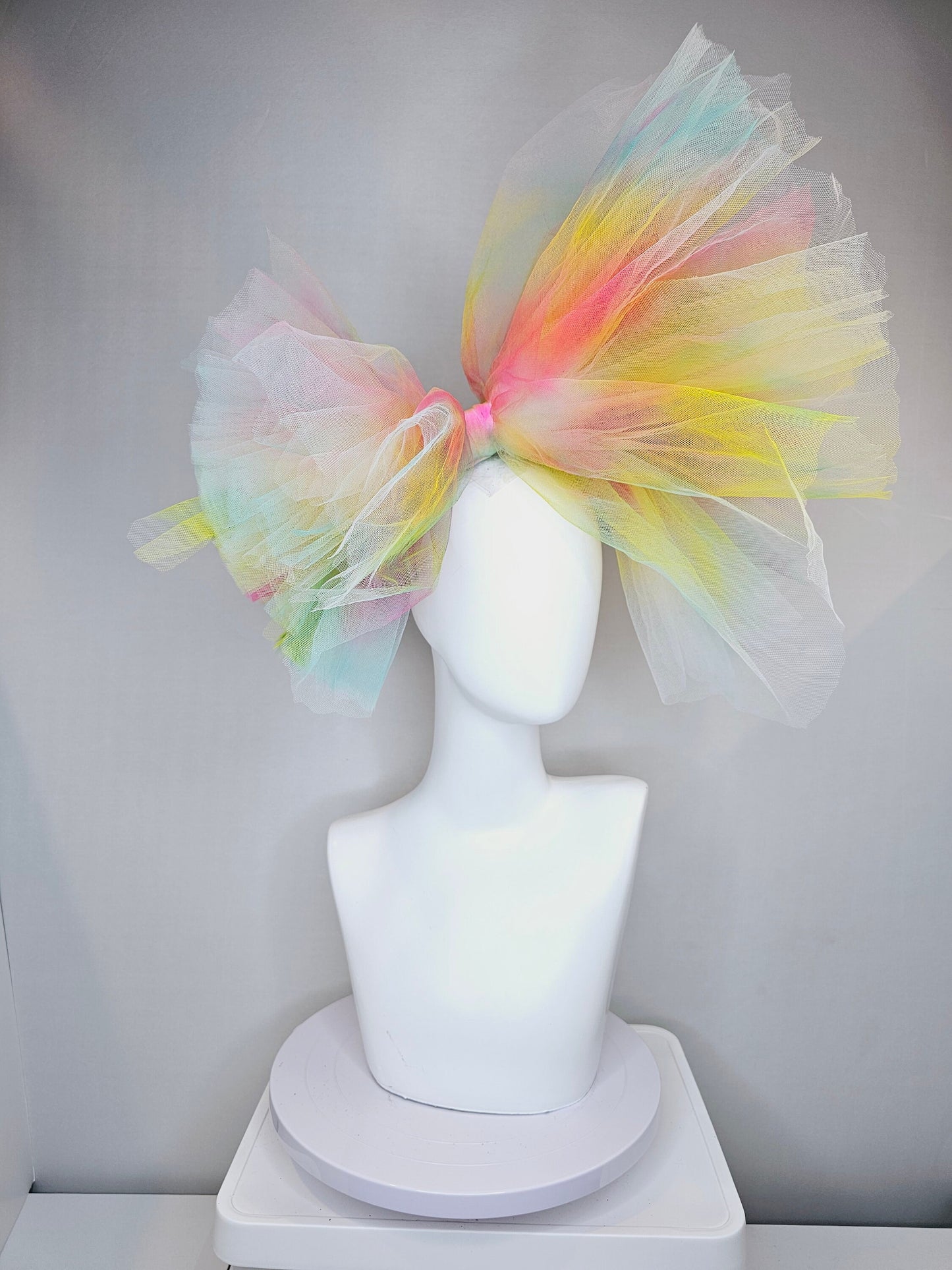 kentucky derby hat fascinator very large netting colorful distressed tulle rainbow sheer asymmetric bow on headband
