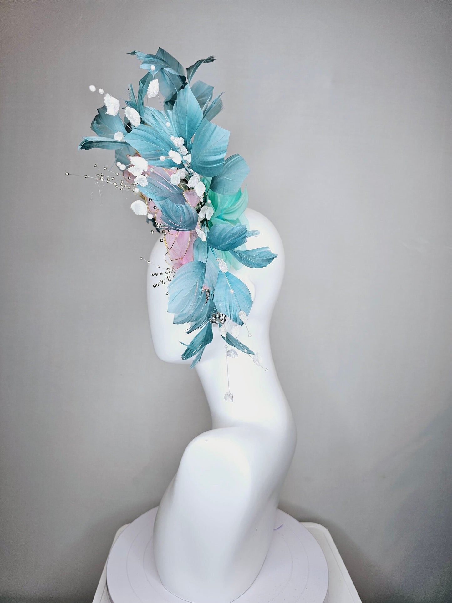 kentucky derby hat fascinator silver swarovski crystal headband with light peacock green blue feathers with pink wired flowers and pearls
