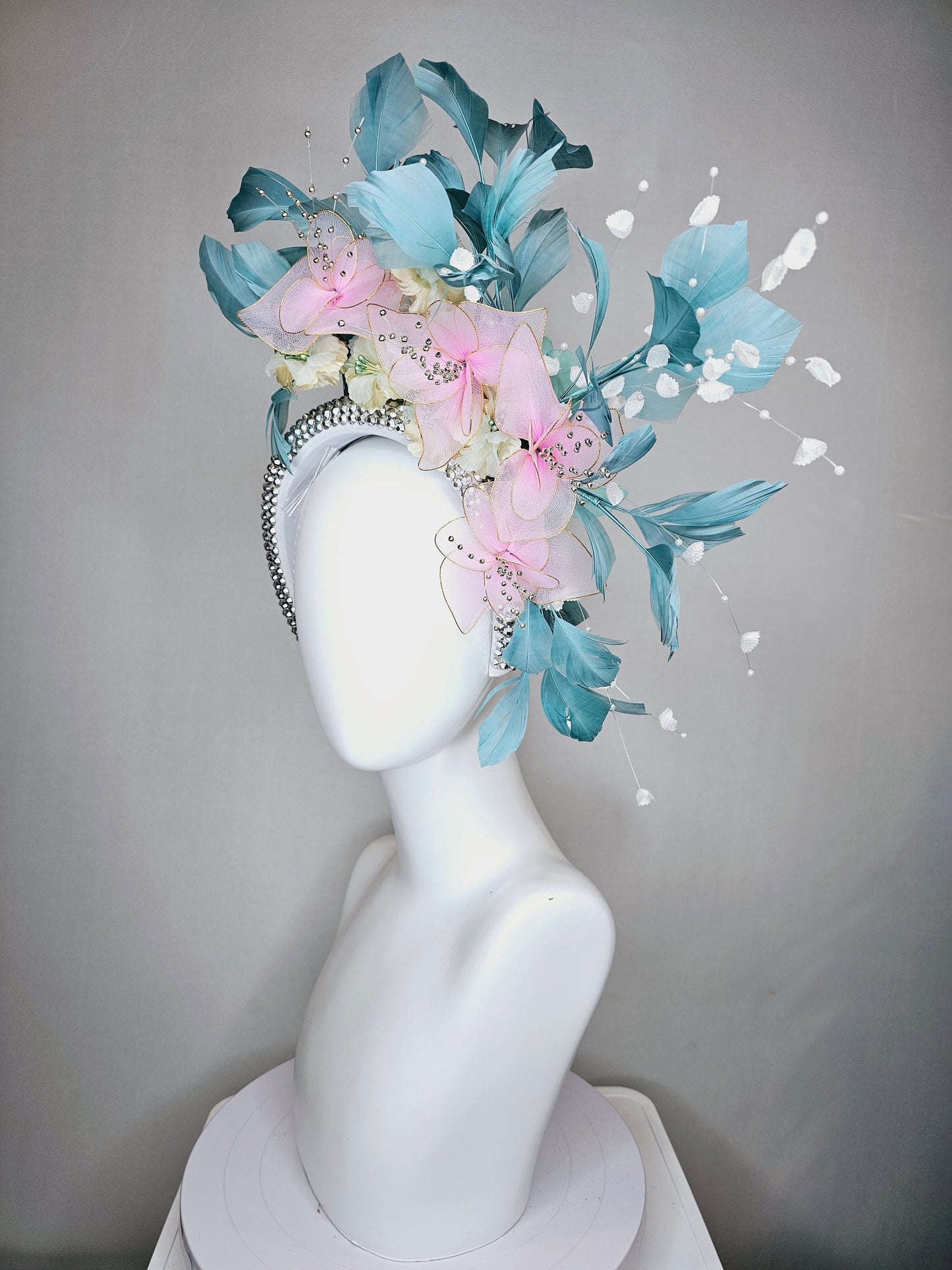 kentucky derby hat fascinator silver swarovski crystal headband with light peacock green blue feathers with pink wired flowers and pearls
