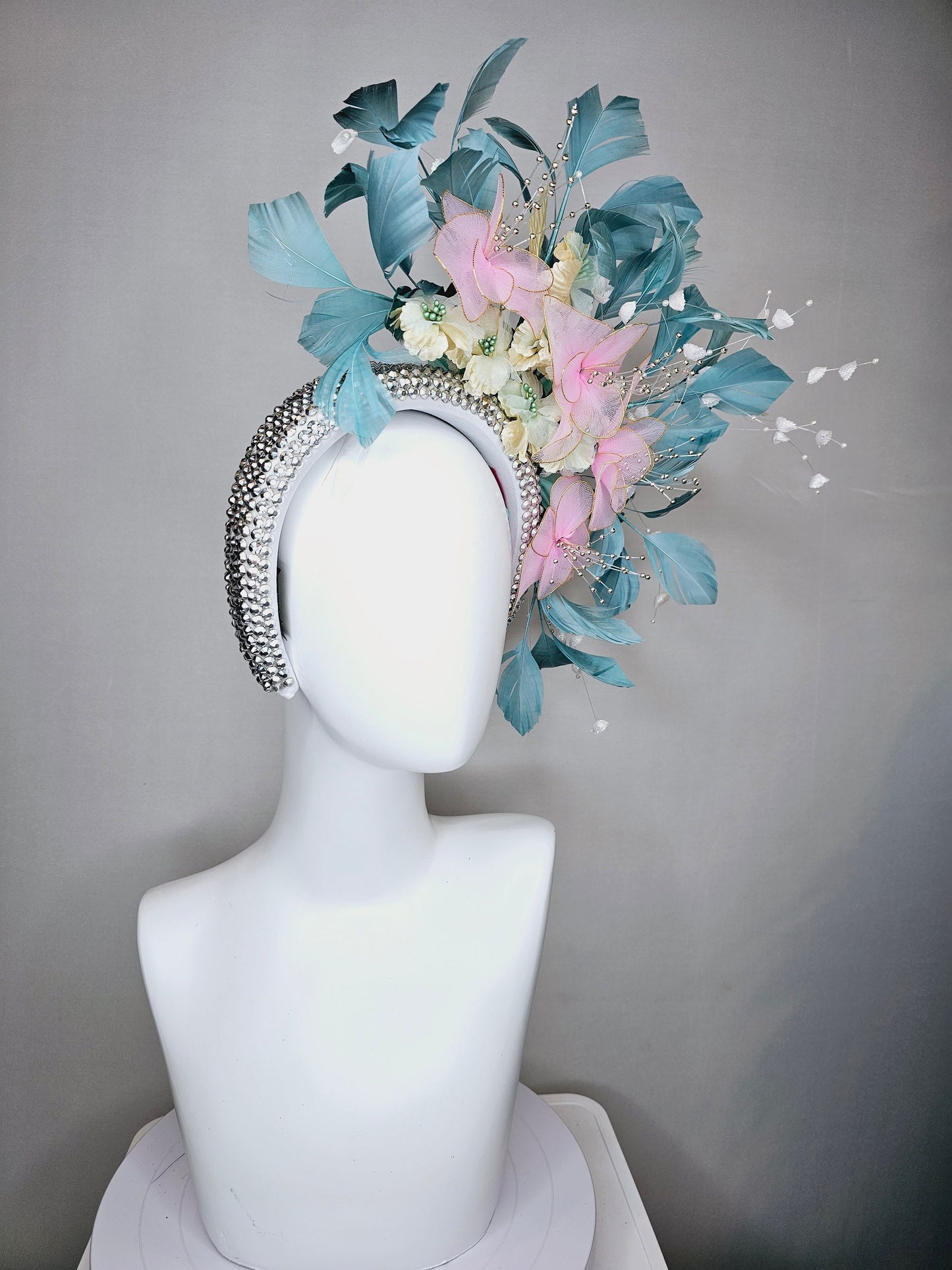 kentucky derby hat fascinator silver swarovski crystal headband with light peacock green blue feathers with pink wired flowers and pearls
