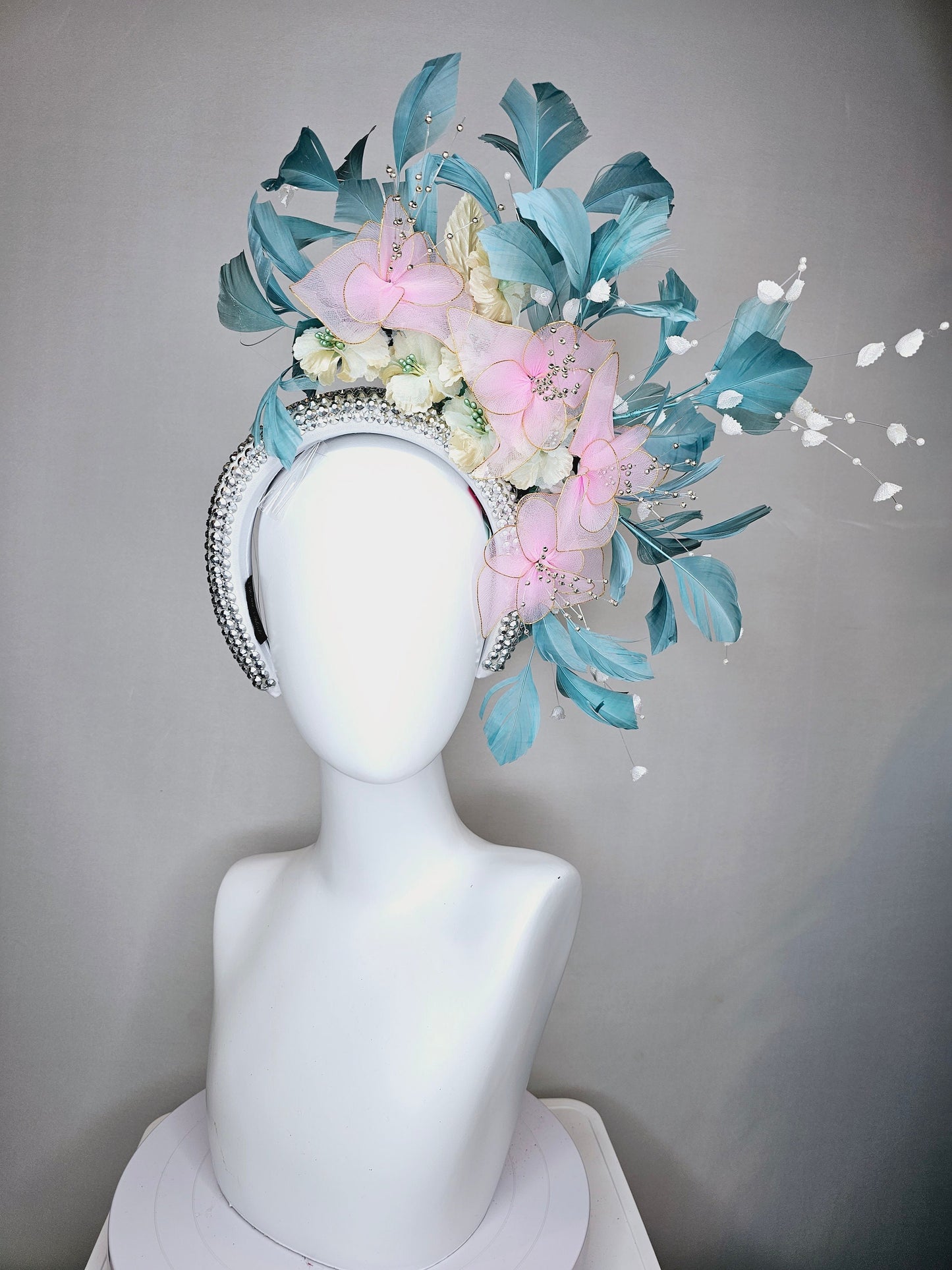 kentucky derby hat fascinator silver swarovski crystal headband with light peacock green blue feathers with pink wired flowers and pearls