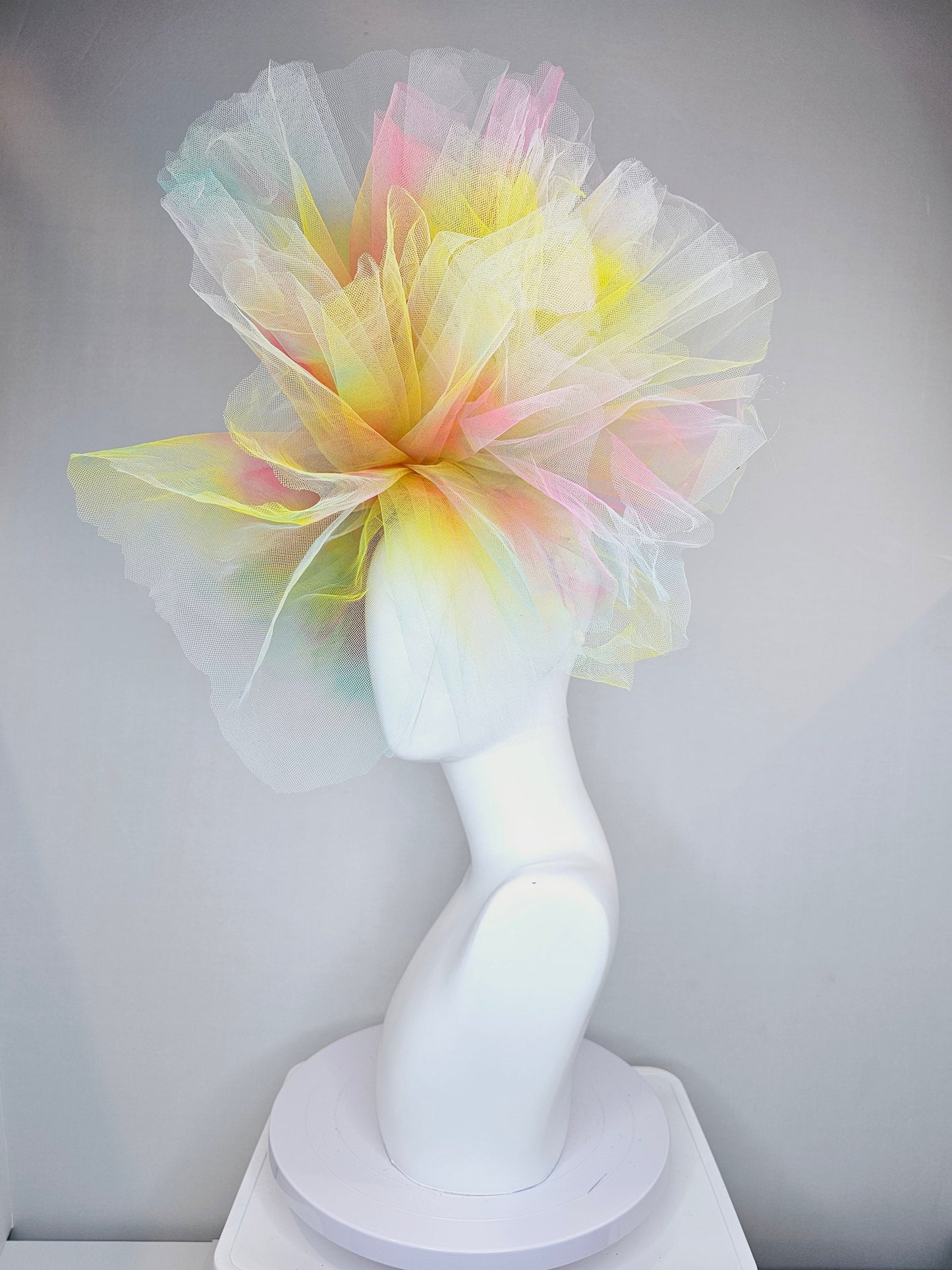 kentucky derby hat fascinator very large netting colorful distressed tulle rainbow sheer asymmetric bow on headband
