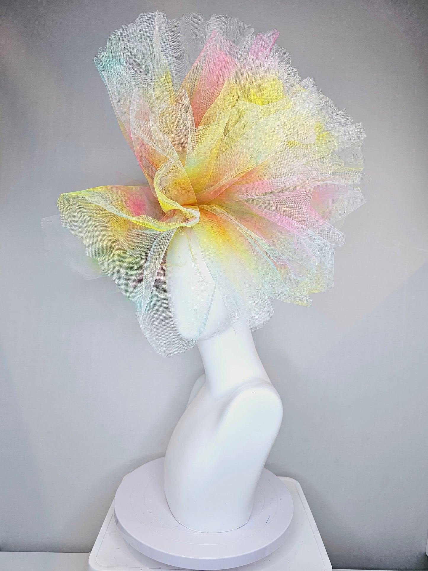 kentucky derby hat fascinator very large netting colorful distressed tulle rainbow sheer asymmetric bow on headband