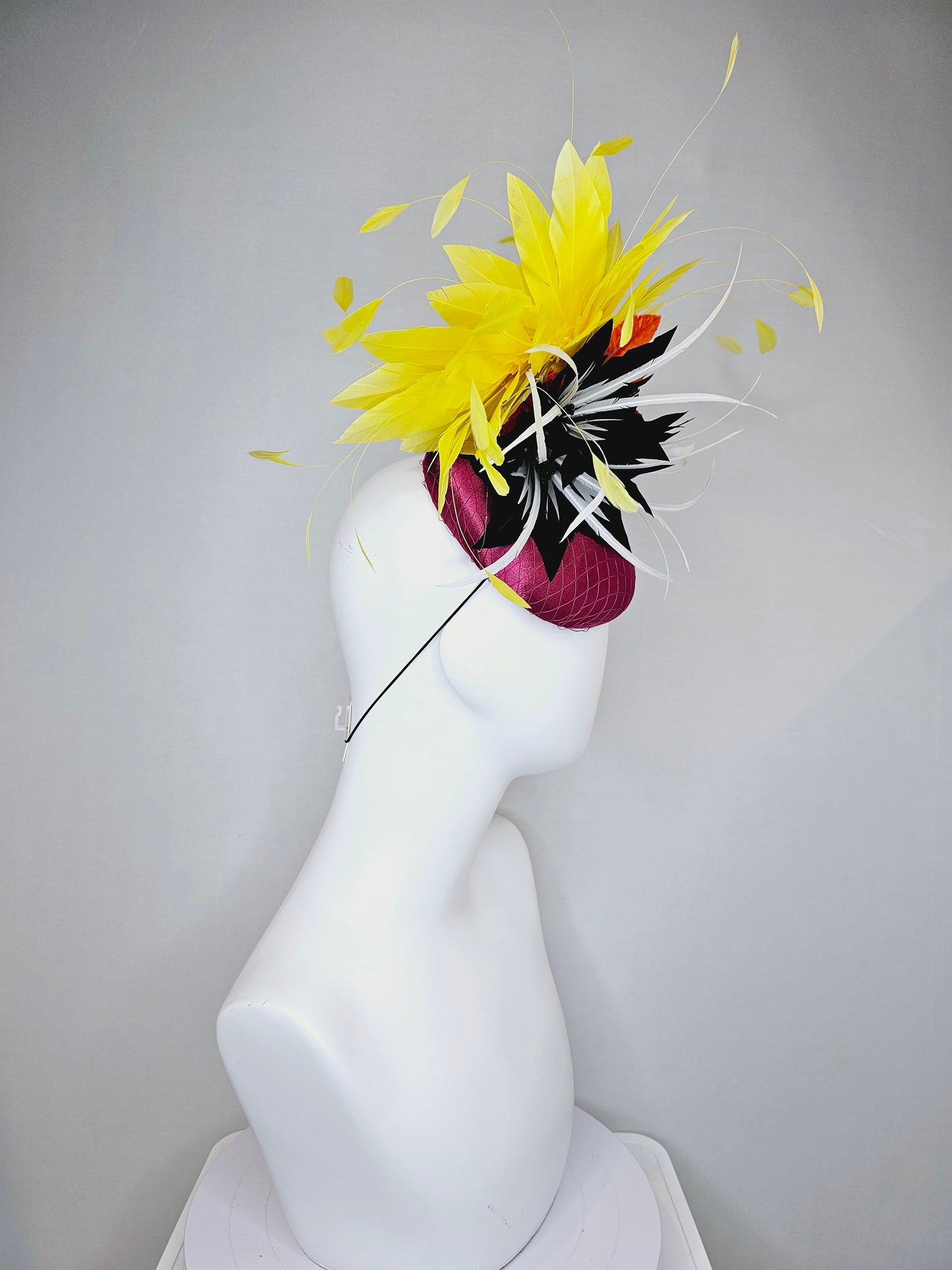 kentucky derby hat fascinator magenta purple pink satin fascinator with black feather flower coral orange leaves and yellow feathers