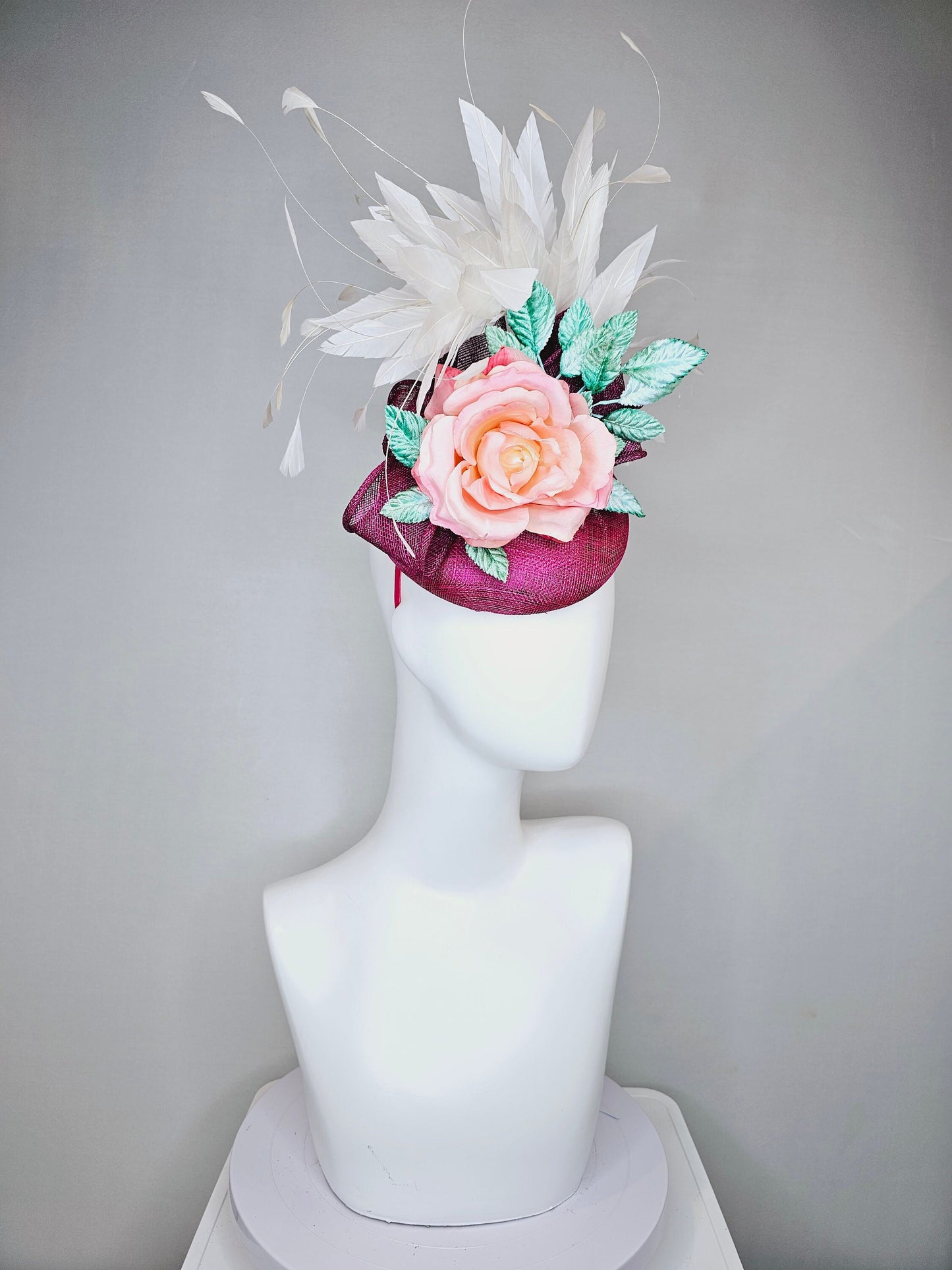 kentucky derby hat fascinator magenta purple sinamay with white feathers pink ombre rose flower and teal blue leaves
