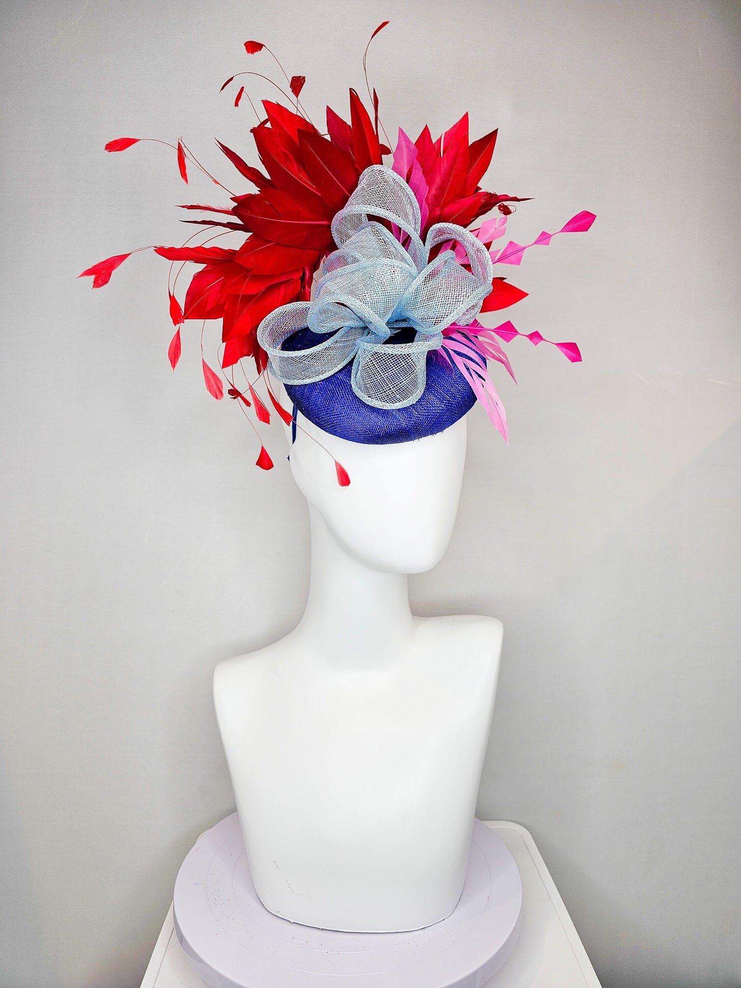 kentucky derby hat fascinator royal blue sinamay with red feathers light blue sinamay bow and pink feather accent