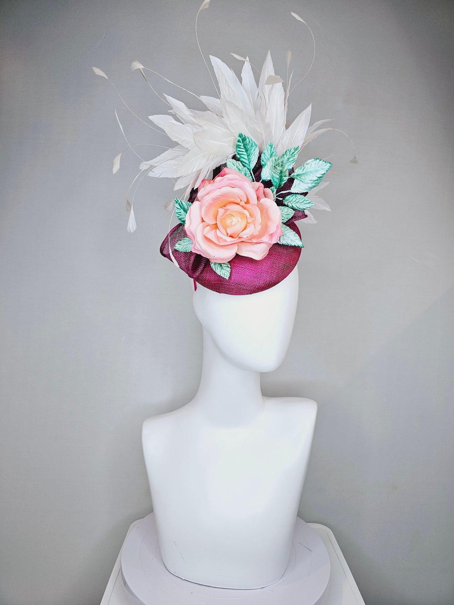 kentucky derby hat fascinator magenta purple sinamay with white feathers pink ombre rose flower and teal blue leaves