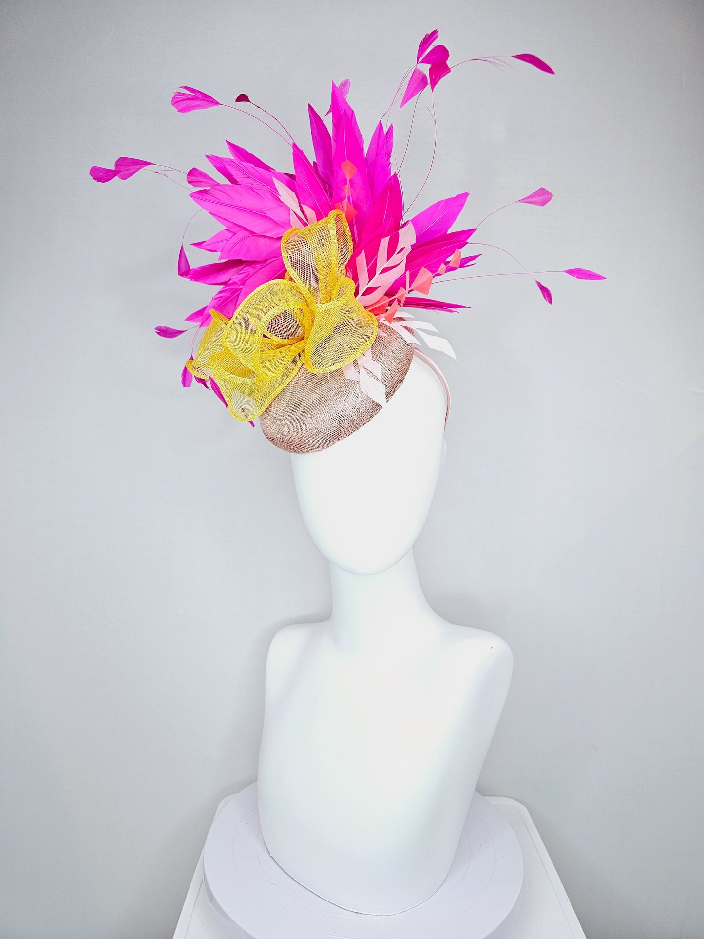 kentucky derby hat fascinator taupe neutral sinamay with pink fuchsia feathers with yellow sinamay bow and lavender feather accent