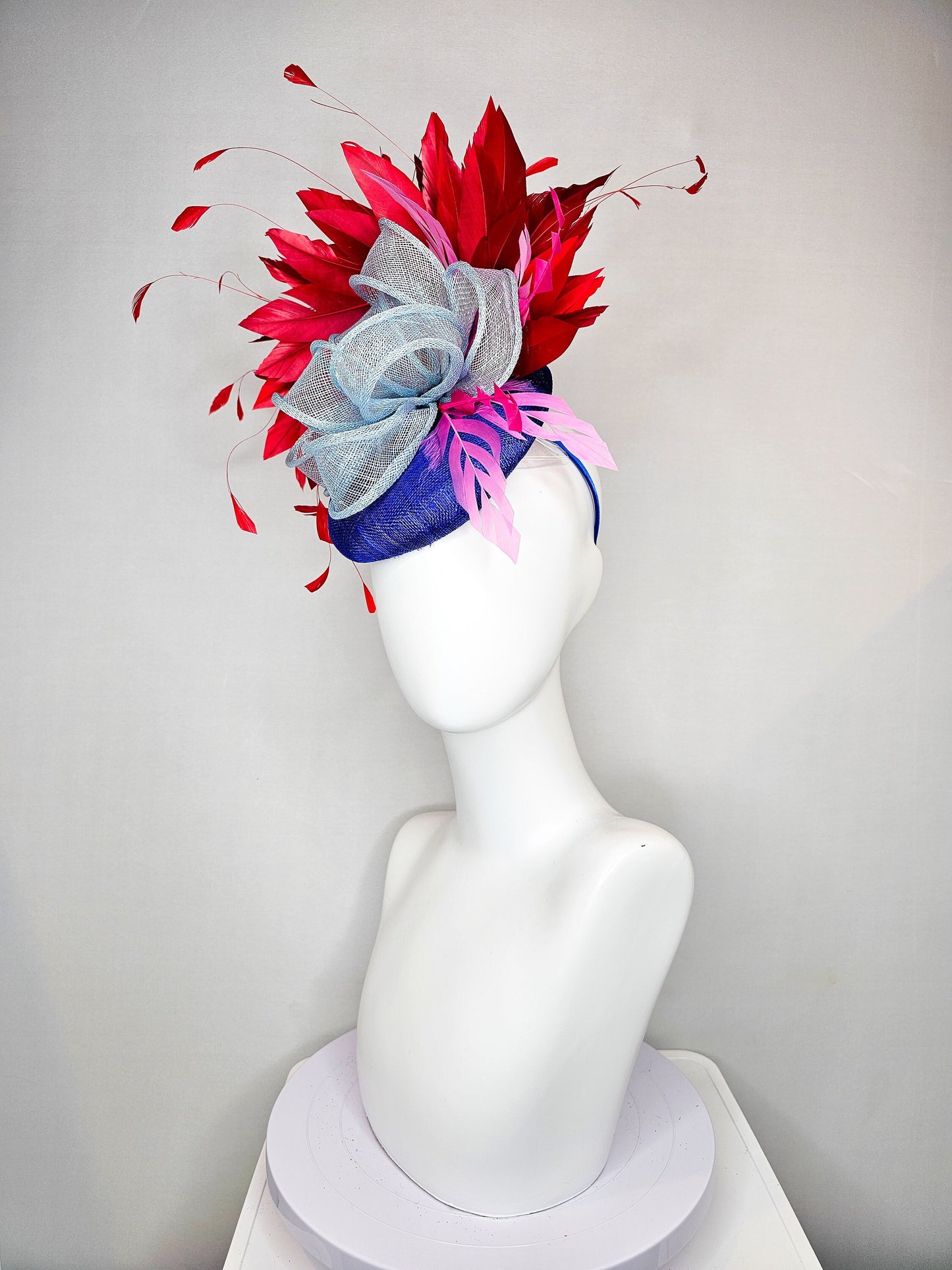 kentucky derby hat fascinator royal blue sinamay with red feathers light blue sinamay bow and pink feather accent