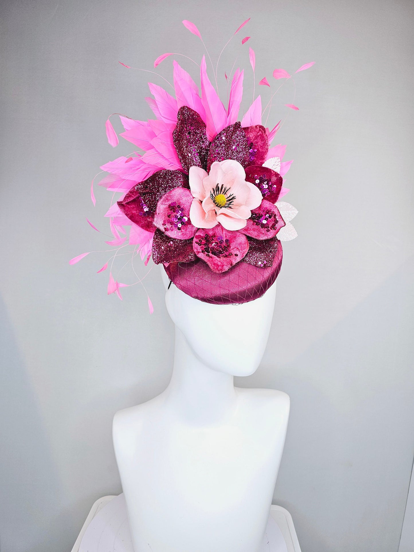 kentucky derby hat fascinator magenta purple maroon satin with pink feathers and light pink flower with glitter magenta petals and leaves
