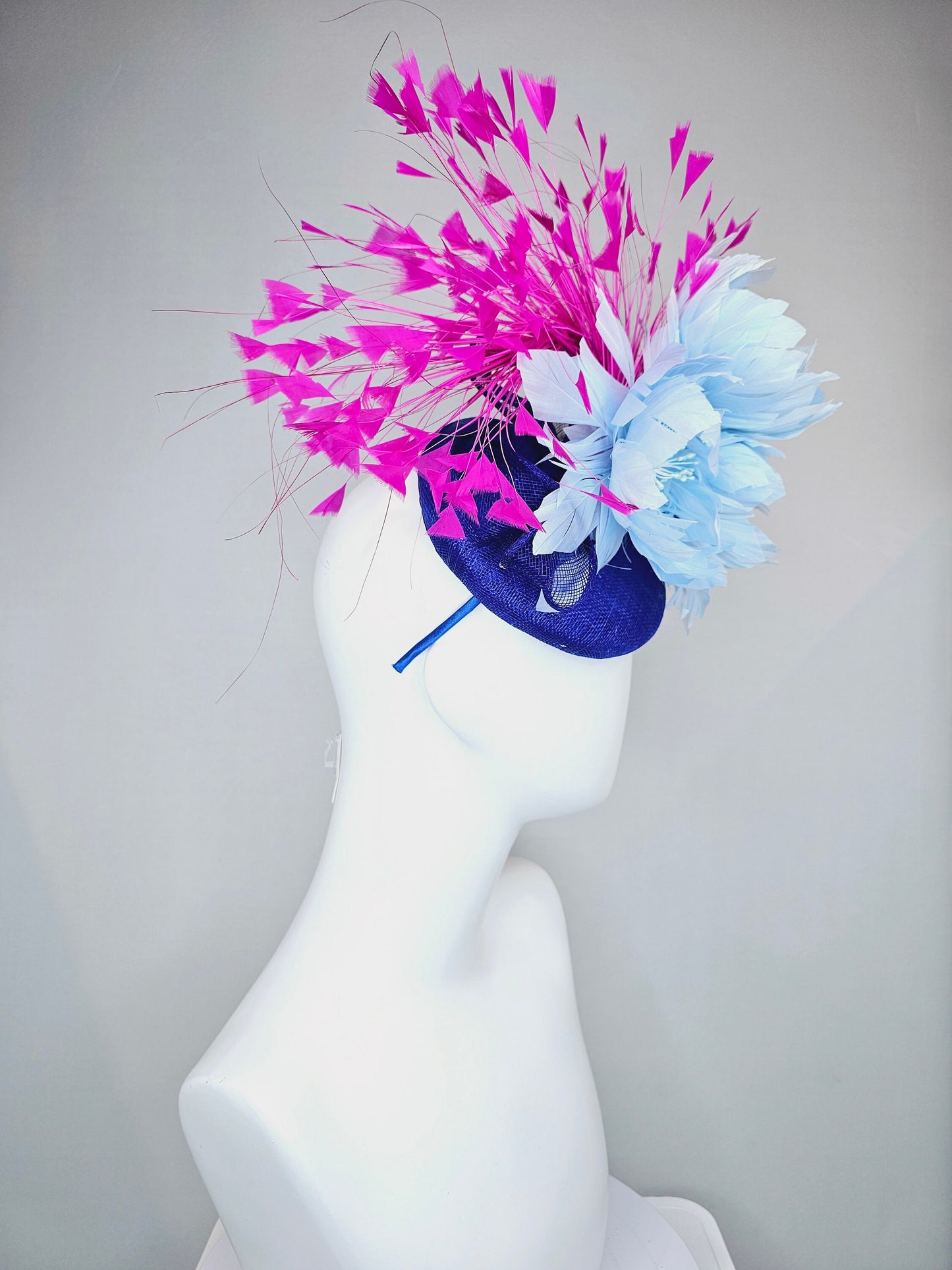 kentucky derby hat fascinator royal blue sinamay with large fluffy light blue feather flowers and fuchsia hot pink feathers
