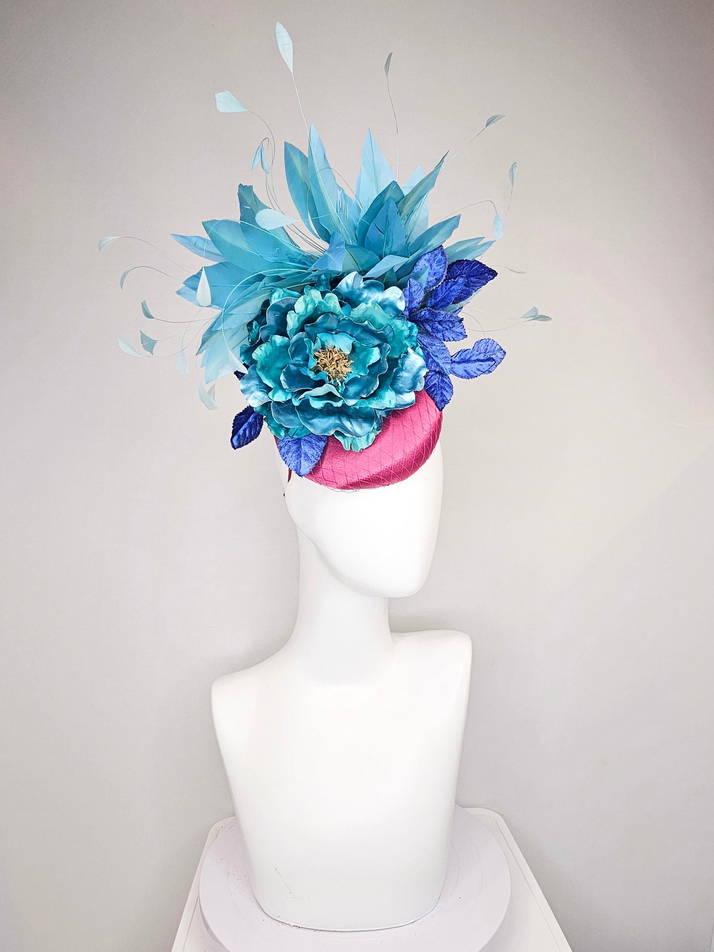 kentucky derby hat fascinator fuchsia magenta satin teal metallic blue green flower royal blue leaves peacock teal blue green feathers