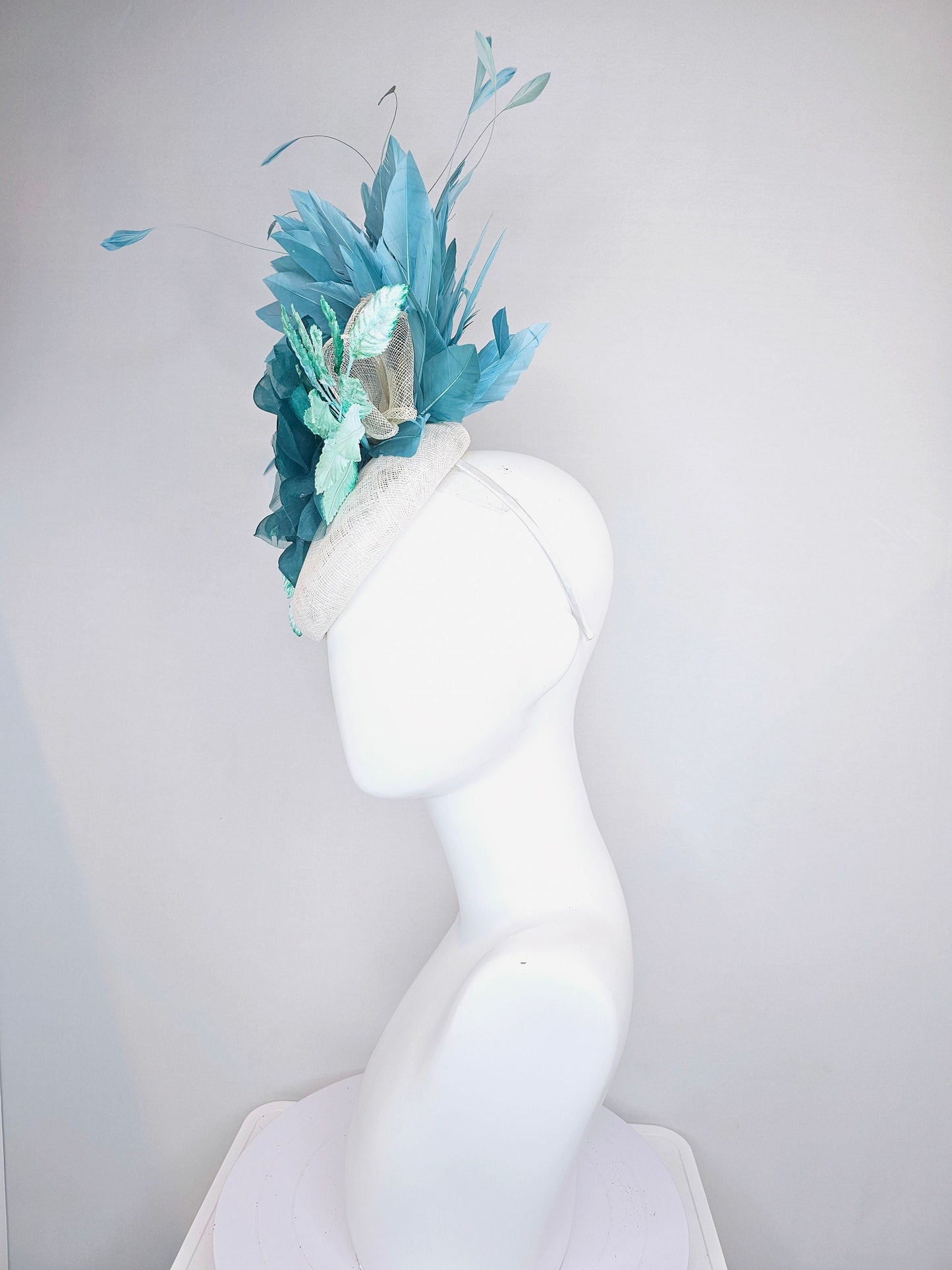 kentucky derby hat fascinator dark hunter green teal organza rose with teal green blue feathers and bright teal green blue velvet leaves